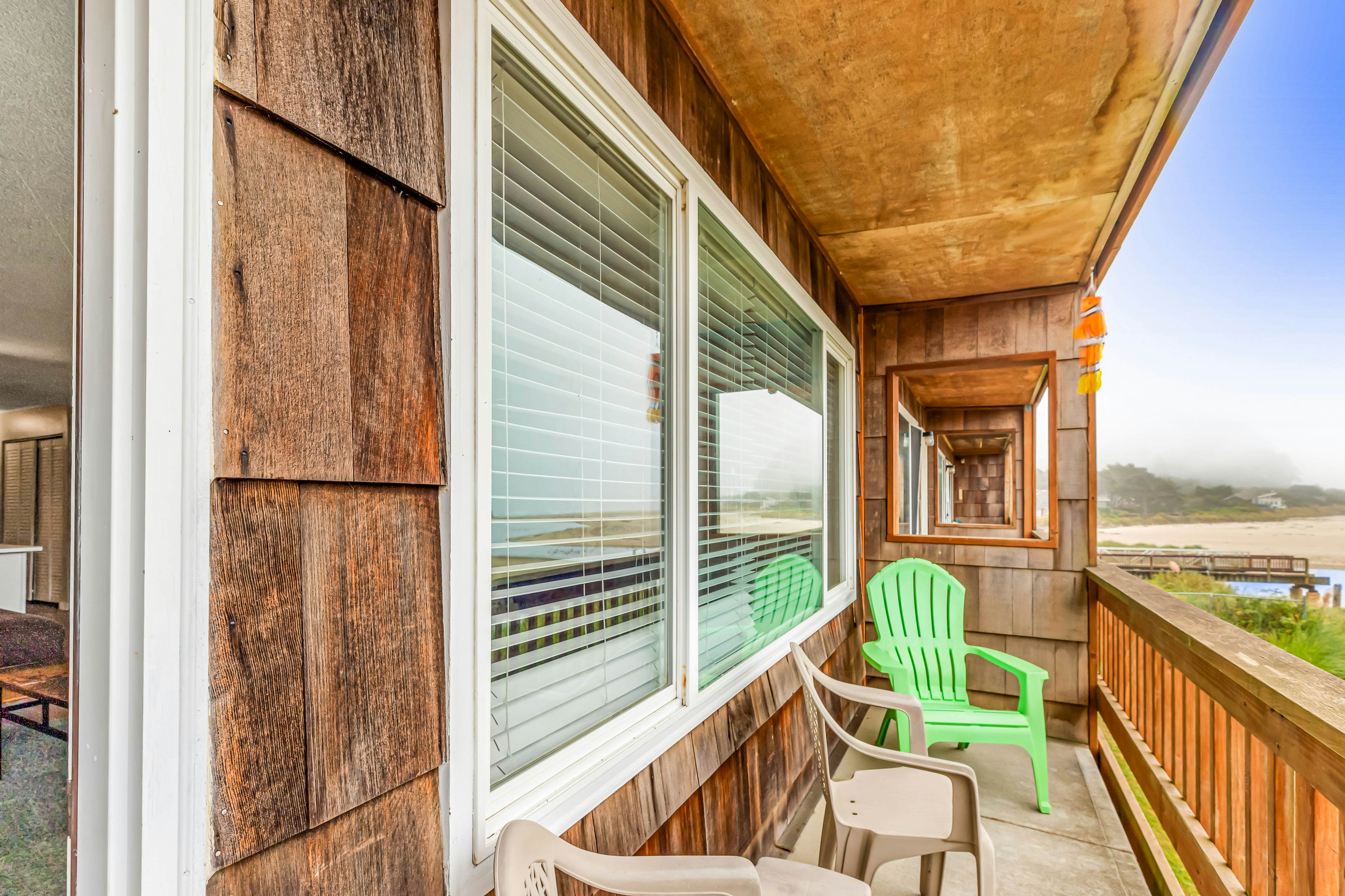 Oceanfront, 2nd-floor condo with river/ocean views, balcony & beach access