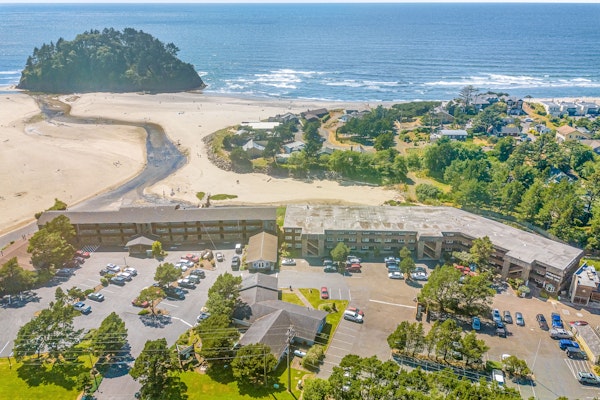 Creekfront Condo with Private Patio Beach Access Shared with D Gas Grill and Views