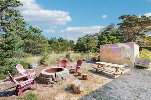 Newly constructed home with firepit and large deck walk to the beach and golf