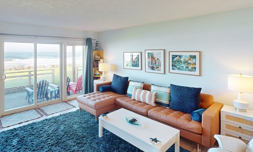 Beautiful ocean front condo with stunning views WiFi steps to beach