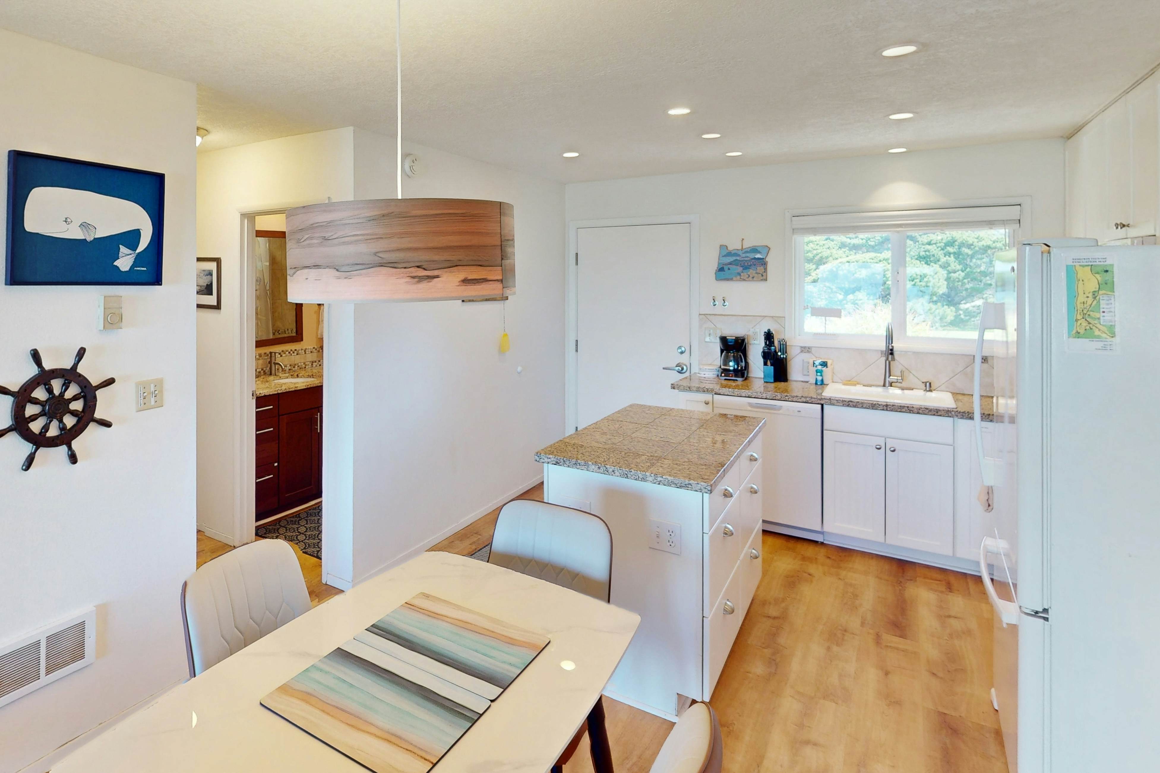 Beautiful ocean front condo with stunning views, WiFi, steps to beach