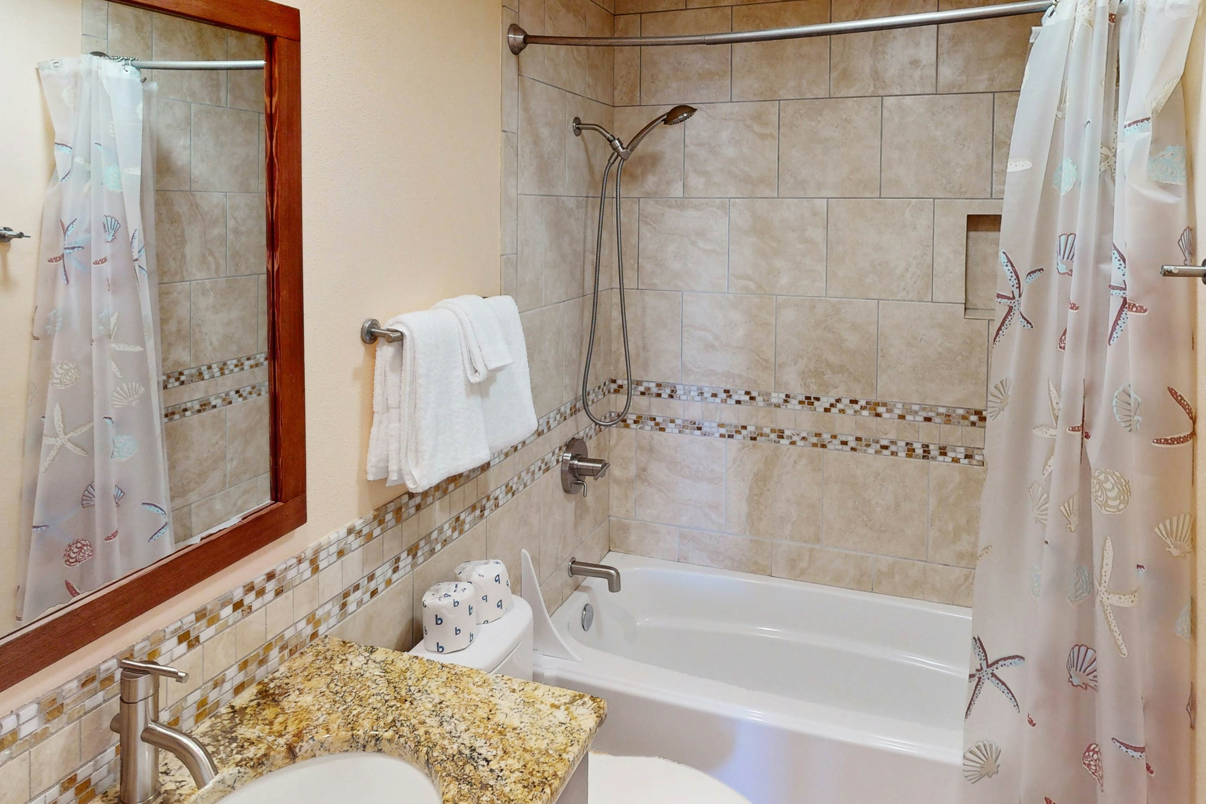 Beautiful ocean front condo with stunning views, WiFi, steps to beach