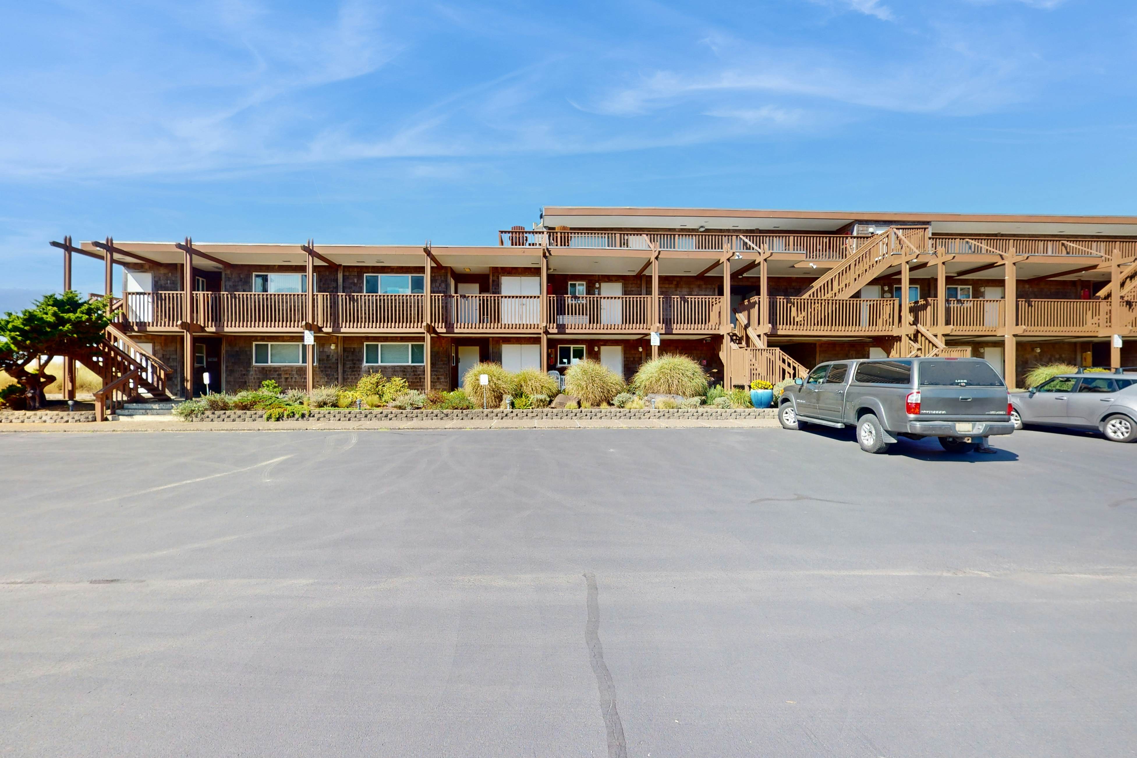 Beautiful ocean front condo with stunning views, WiFi, steps to beach