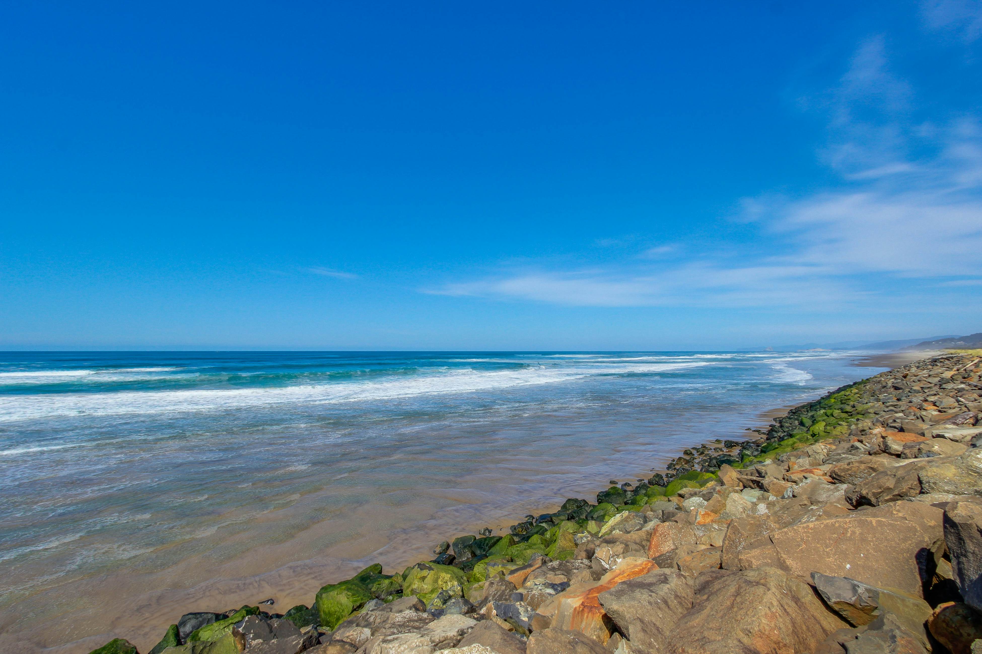 Beautiful ocean front condo with stunning views, WiFi, steps to beach