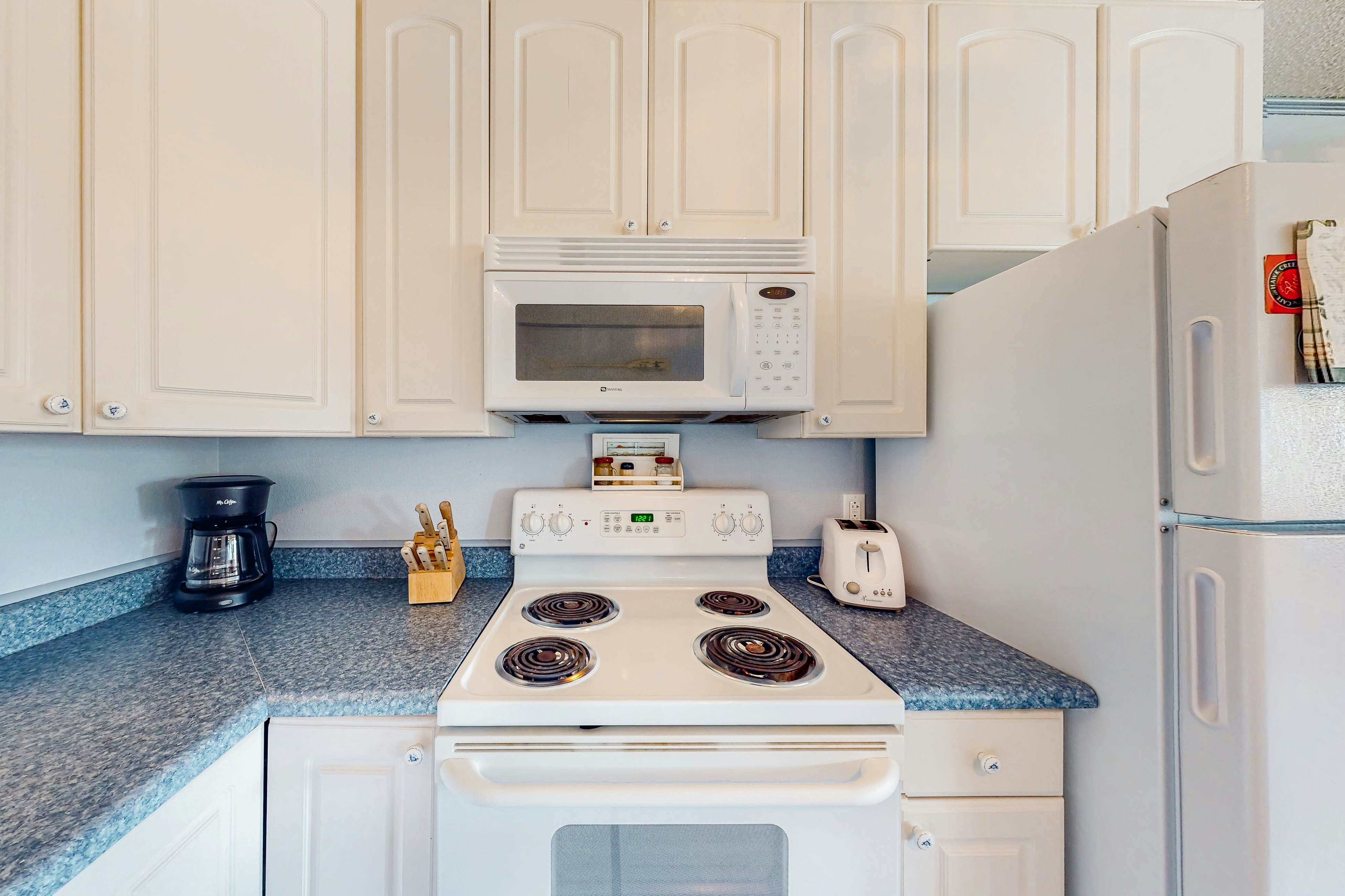 Beachfront condo near the beach with water views, private balcony & cable