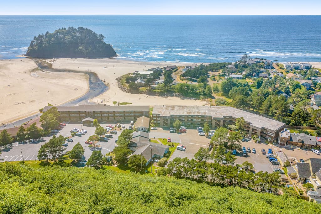 Cozy Coastal Condo Steps from the Beach with Deck Views