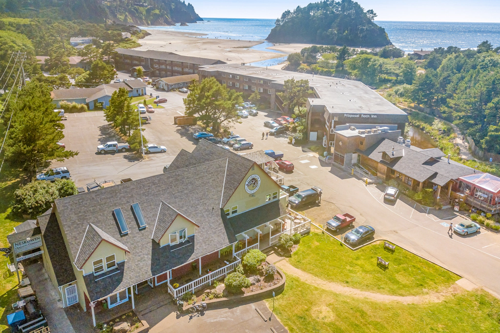 Cozy Coastal Condo Steps from the Beach with Deck Views