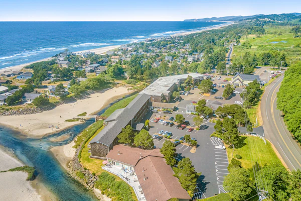 Dog friendly riverfront suite at oceanfront Proposal Rock Inn steps to beach