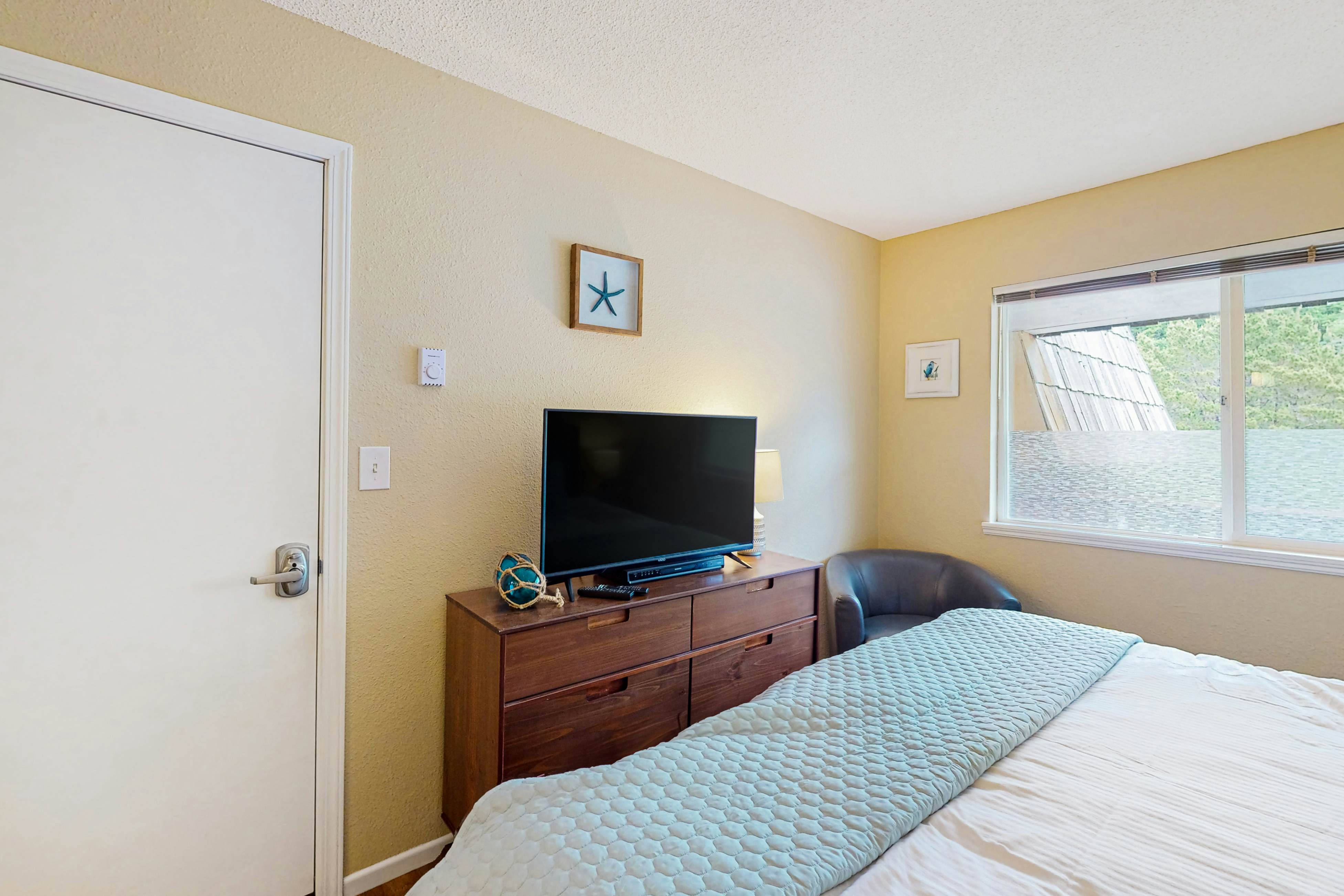 Dog friendly oceanfront condo with beach access and updated interior