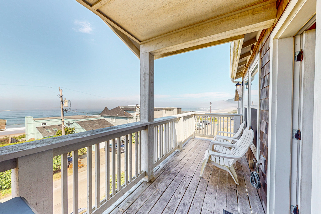 Gorgeous ocean view home with hot tub game room steps to beach