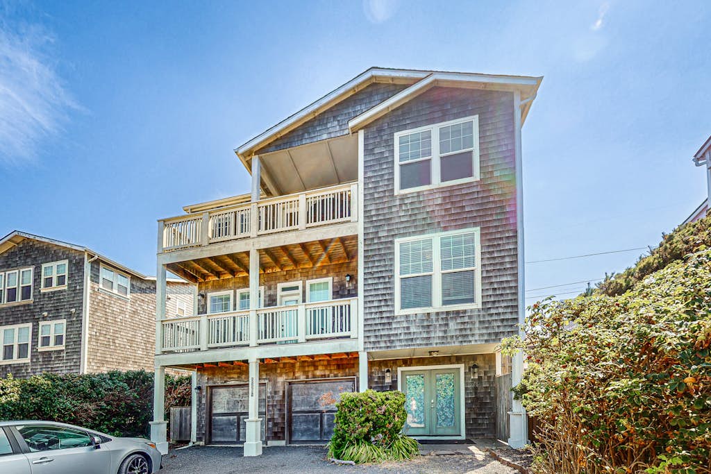 Gorgeous ocean view home with hot tub game room steps to beach