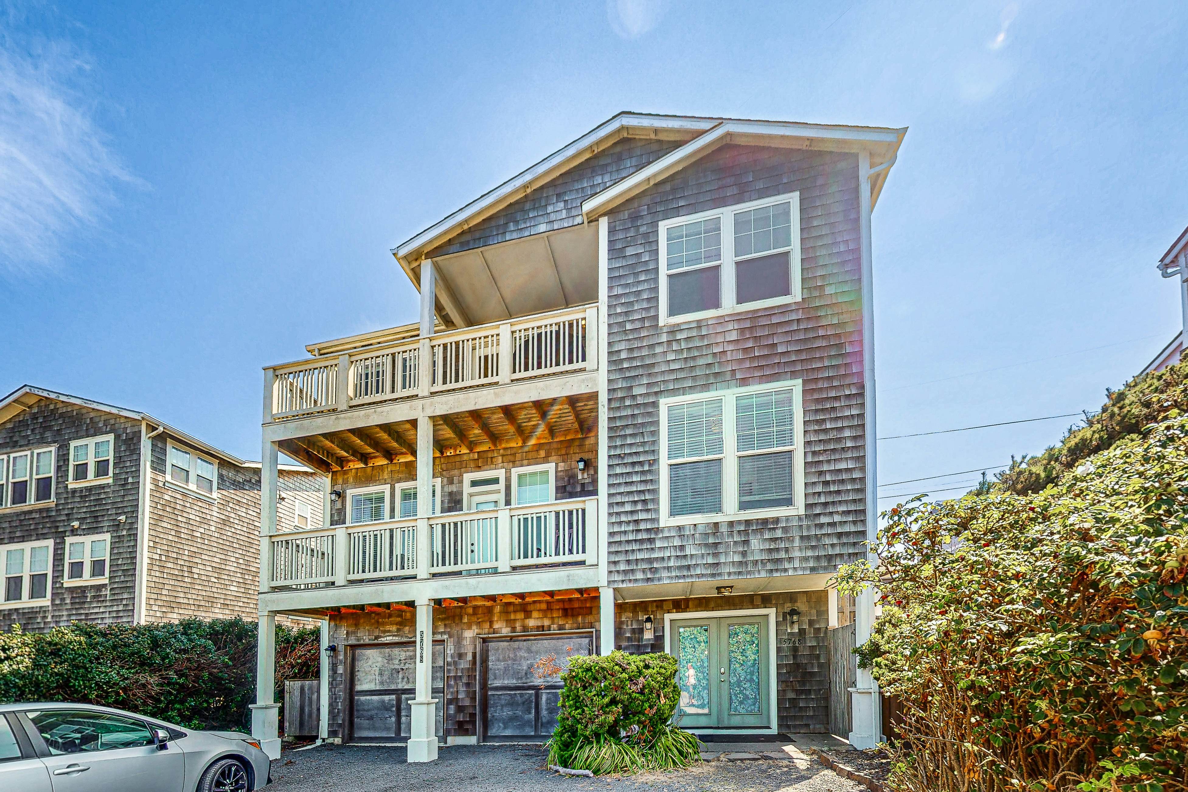 Gorgeous ocean view home with hot tub game room steps to beach