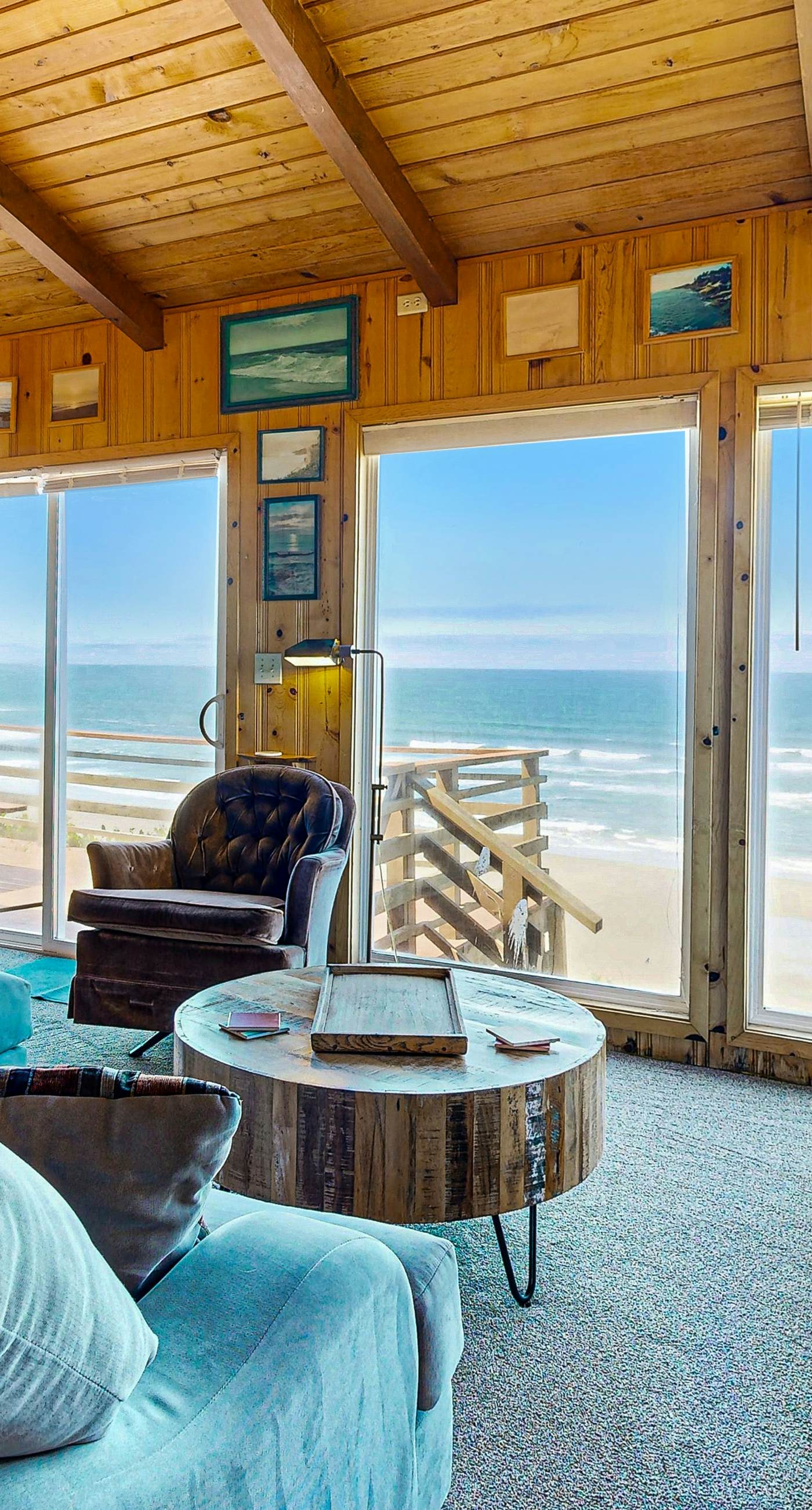 Ocean front home with spacious deck and beach access near shops and restaurants