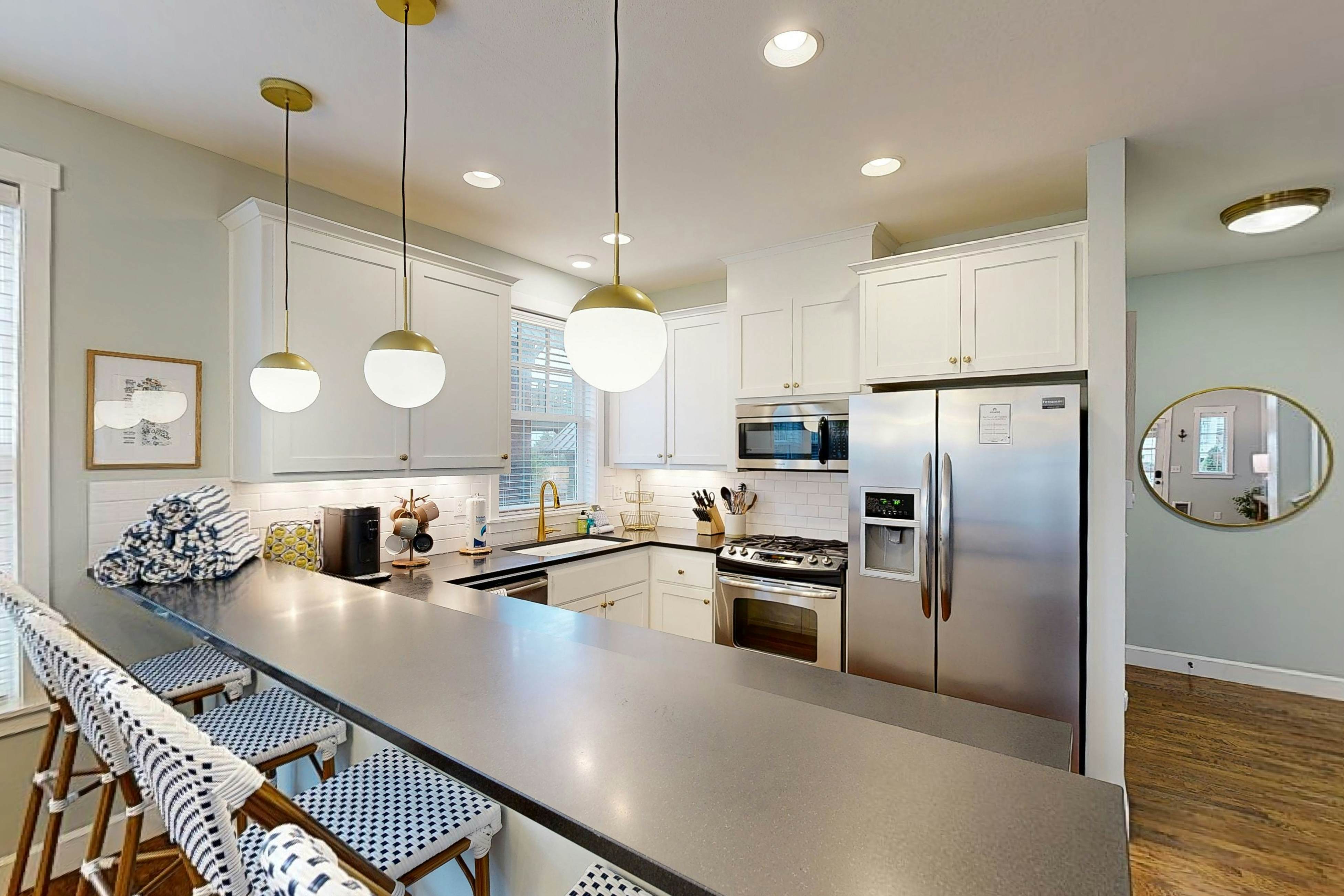 Beautiful home with peek a boo beach views patio with hot tub and firepit WiFi