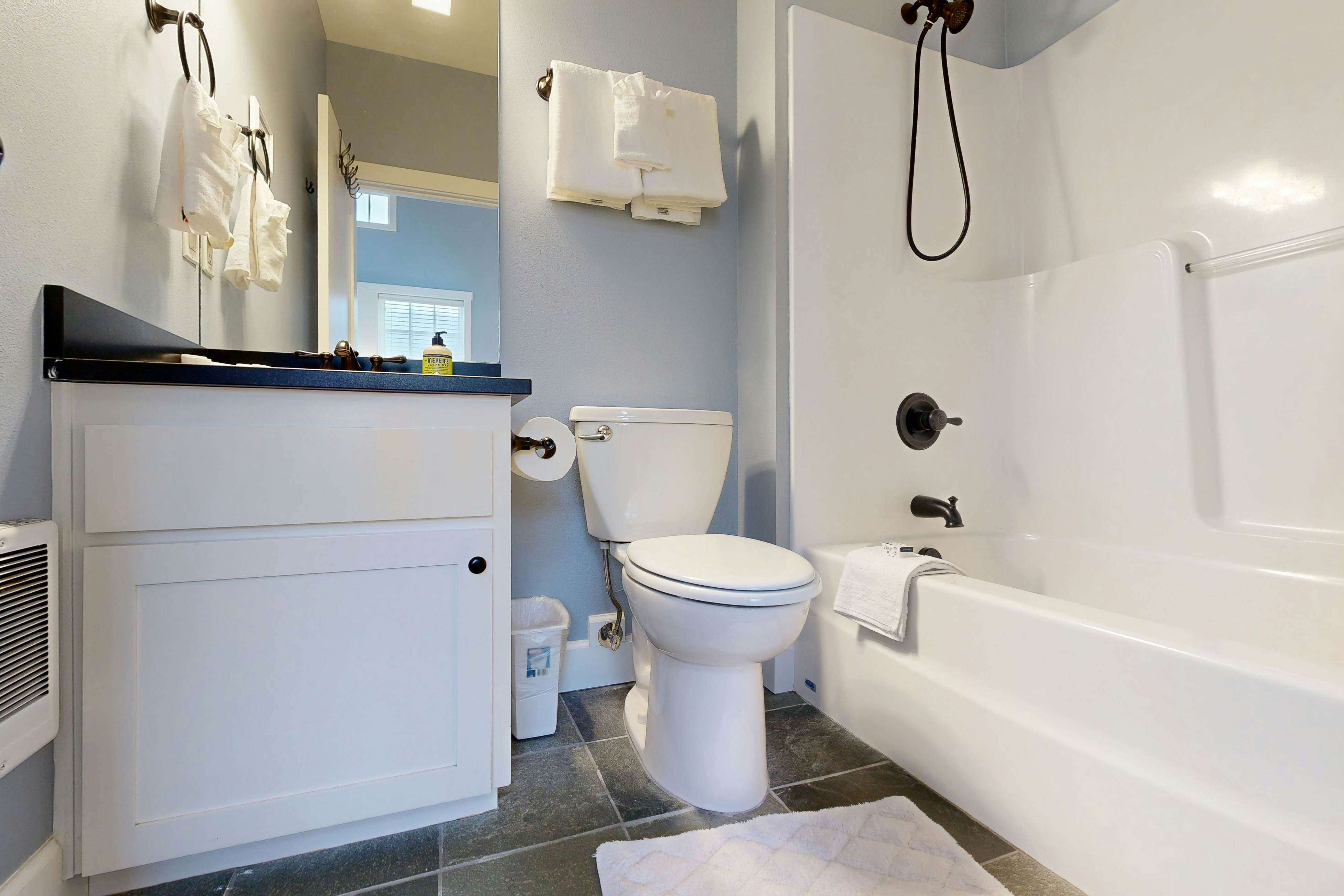 Beautiful home with peek a boo beach views patio with hot tub and firepit WiFi