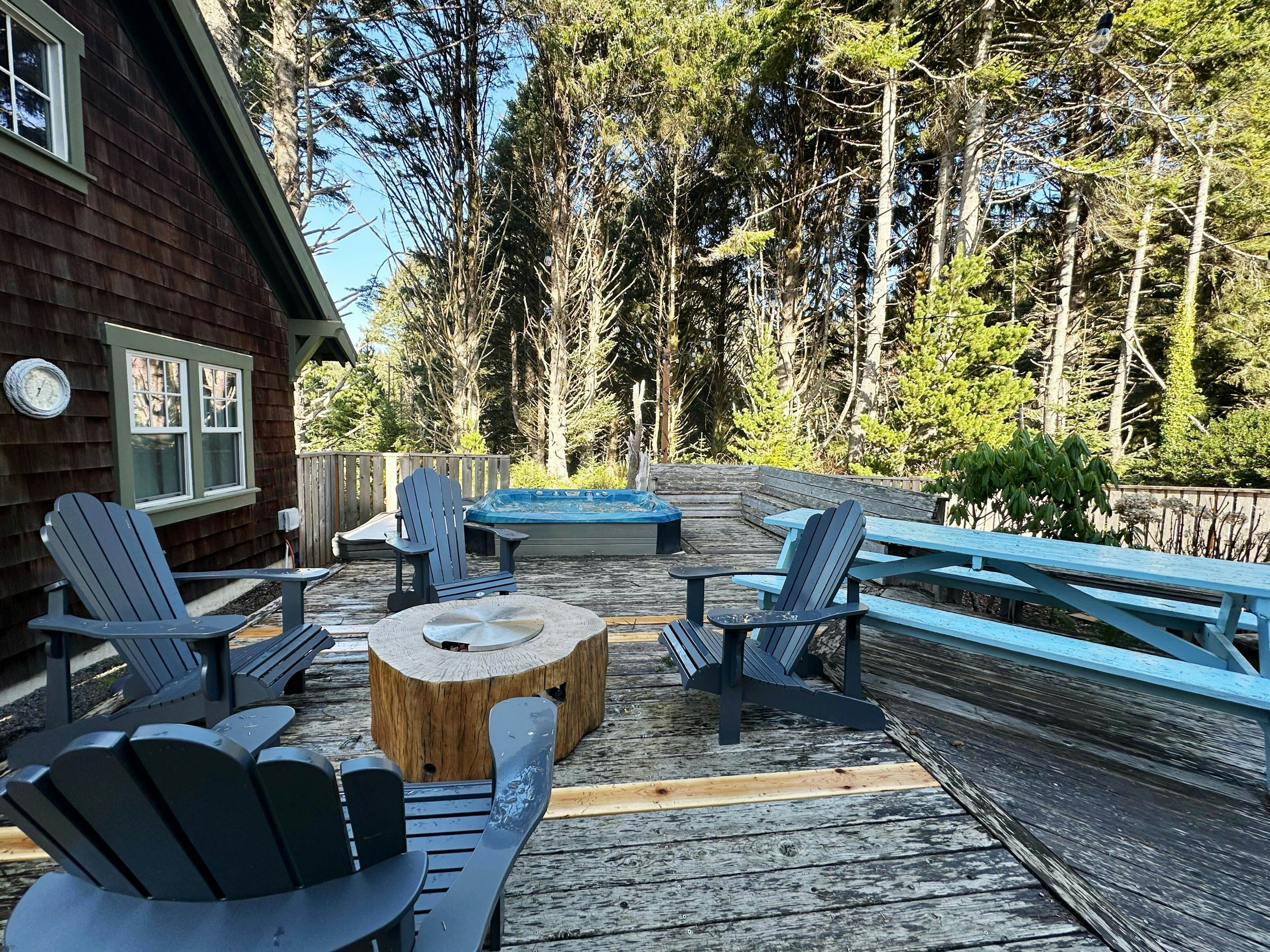 Beautiful home with peek a boo beach views patio with hot tub and firepit WiFi