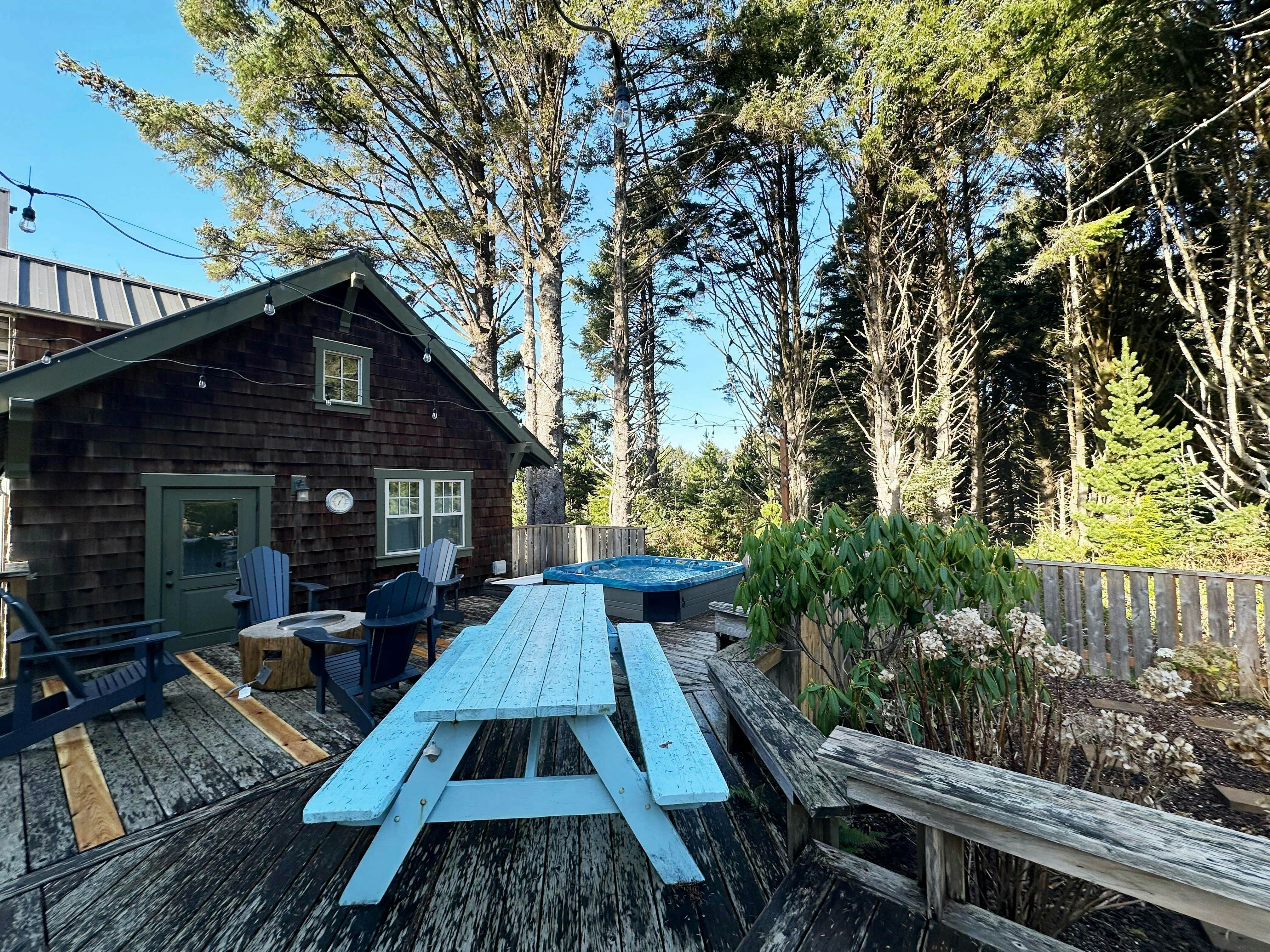 Beautiful home with peek a boo beach views patio with hot tub and firepit WiFi