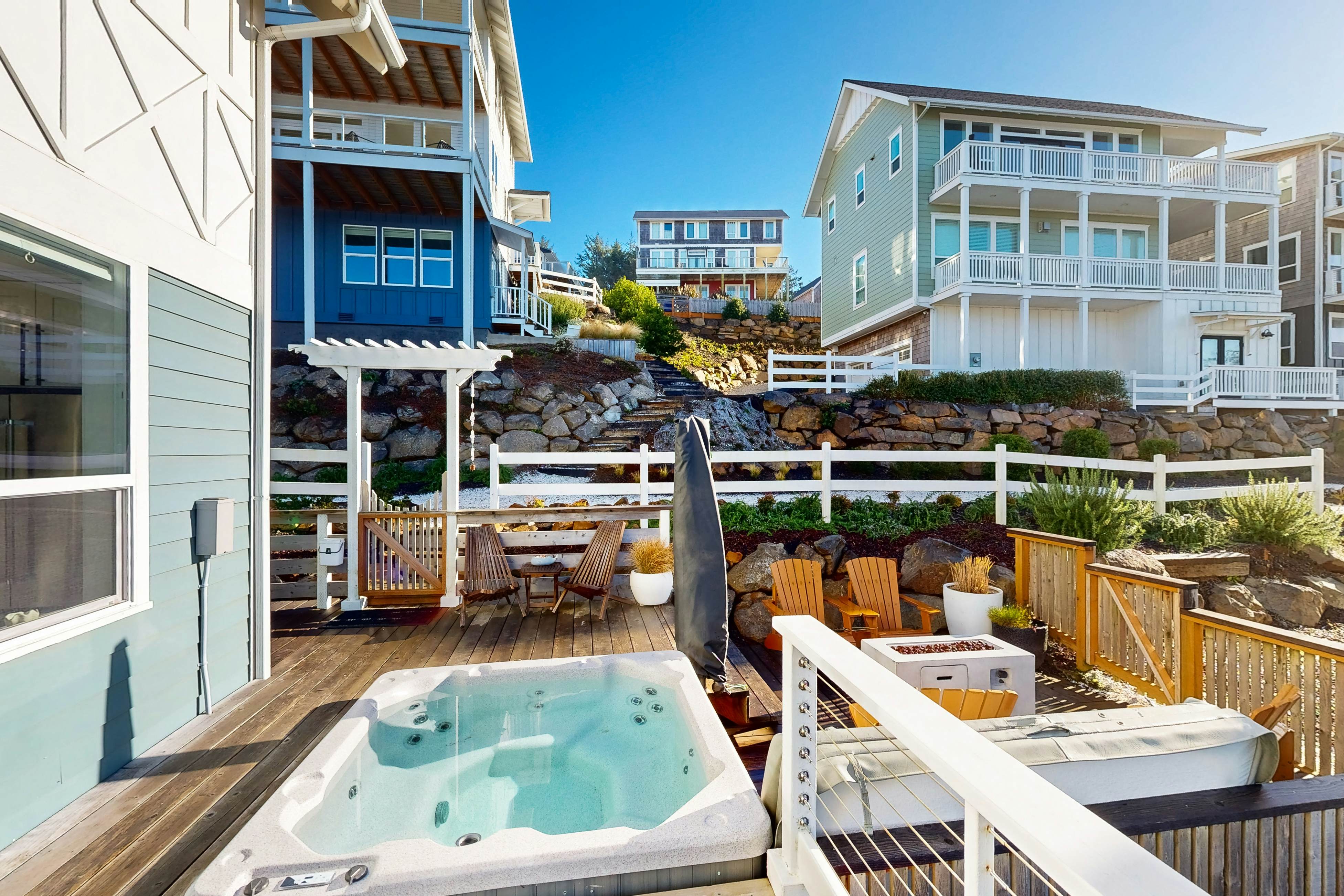 Beautiful family-friendly home with private hot tub, walk to beach, shared pool