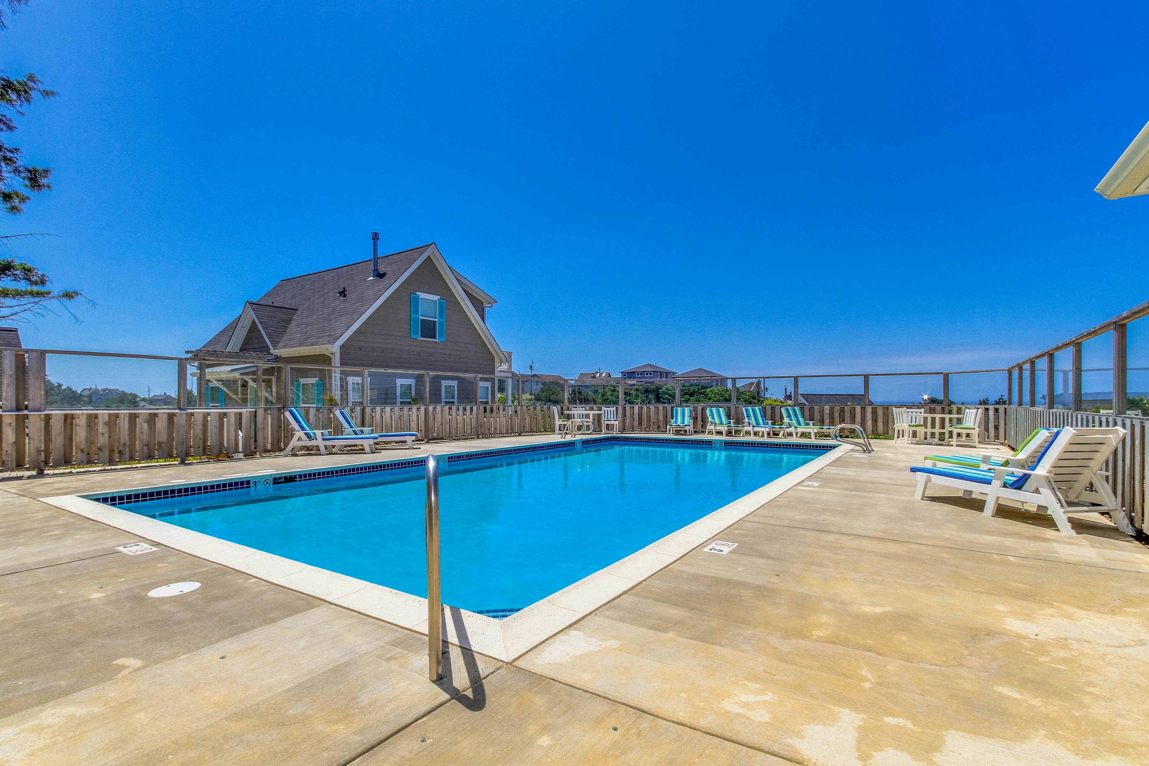 Beautiful family-friendly home with private hot tub, walk to beach, shared pool