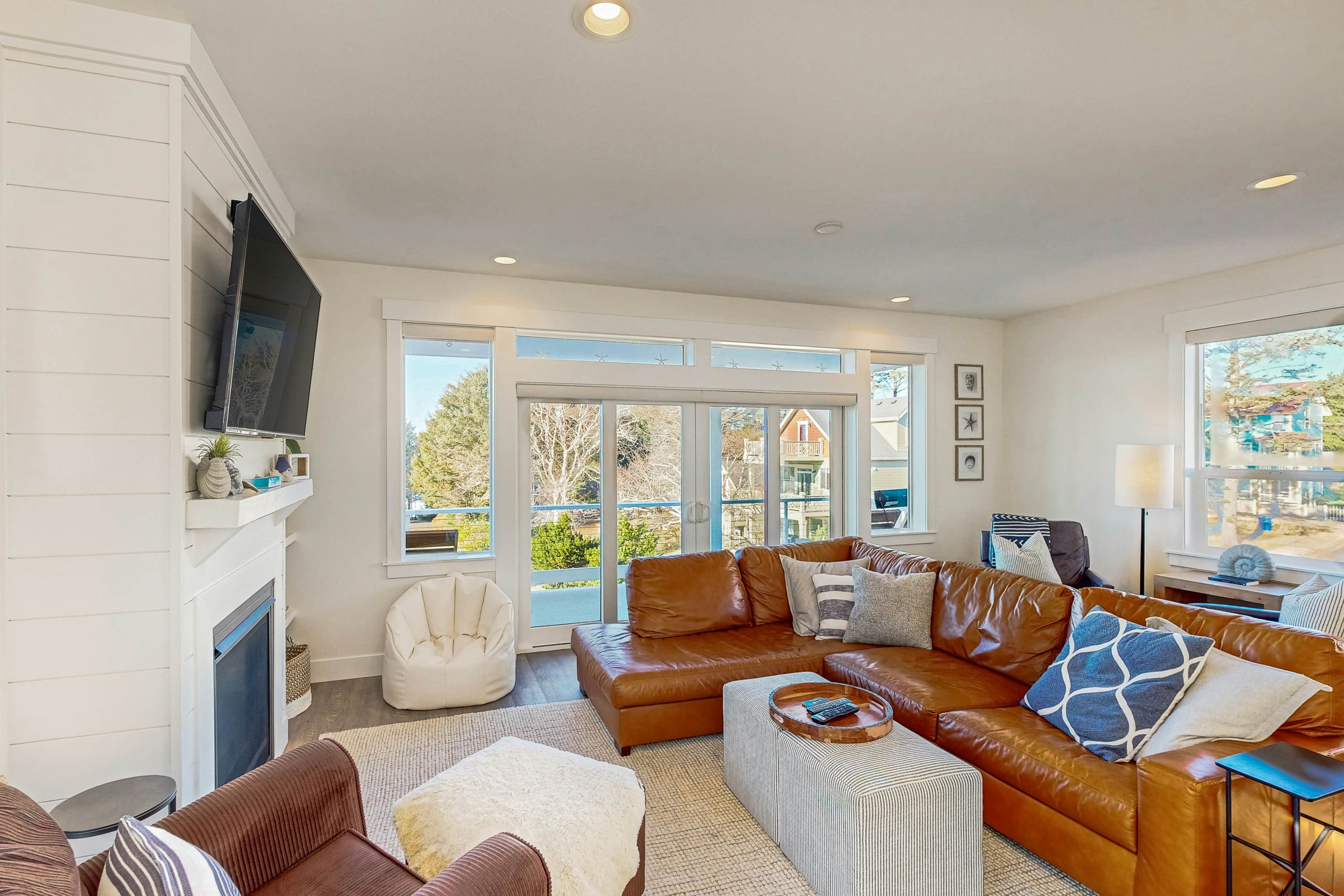 Beautiful family-friendly home with private hot tub, walk to beach, shared pool