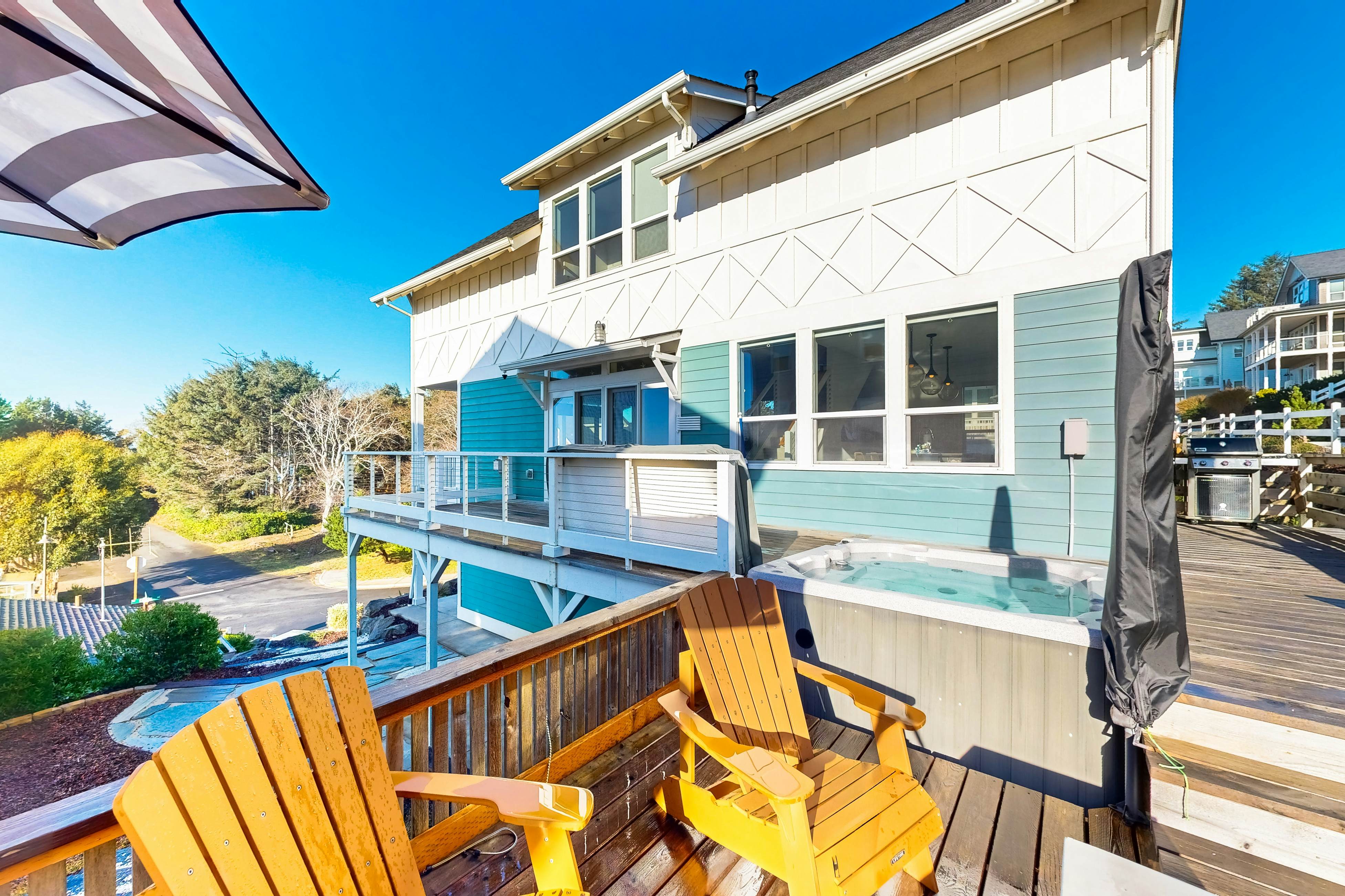 Beautiful family-friendly home with private hot tub, walk to beach, shared pool
