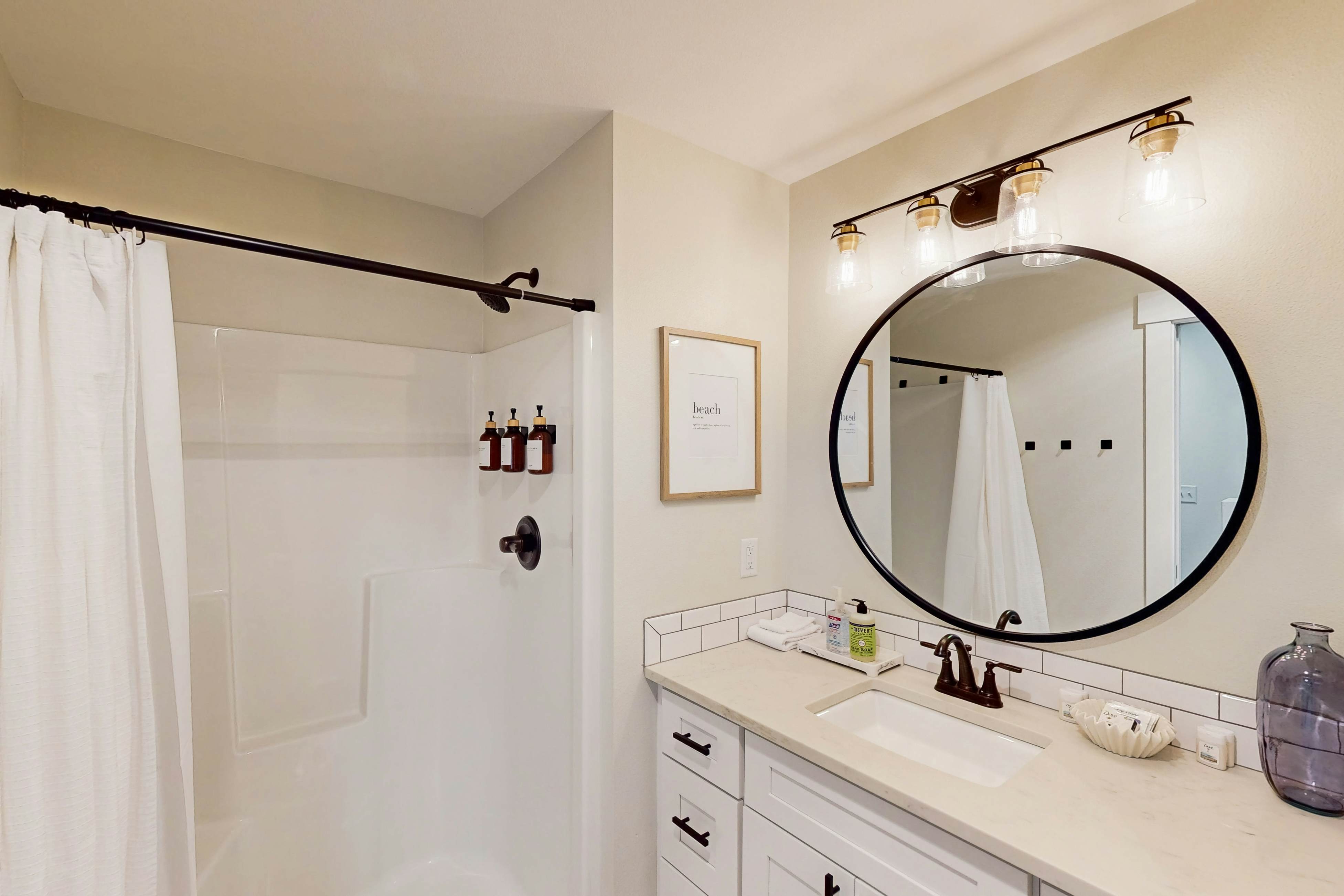 Beautiful family-friendly home with private hot tub, walk to beach, shared pool