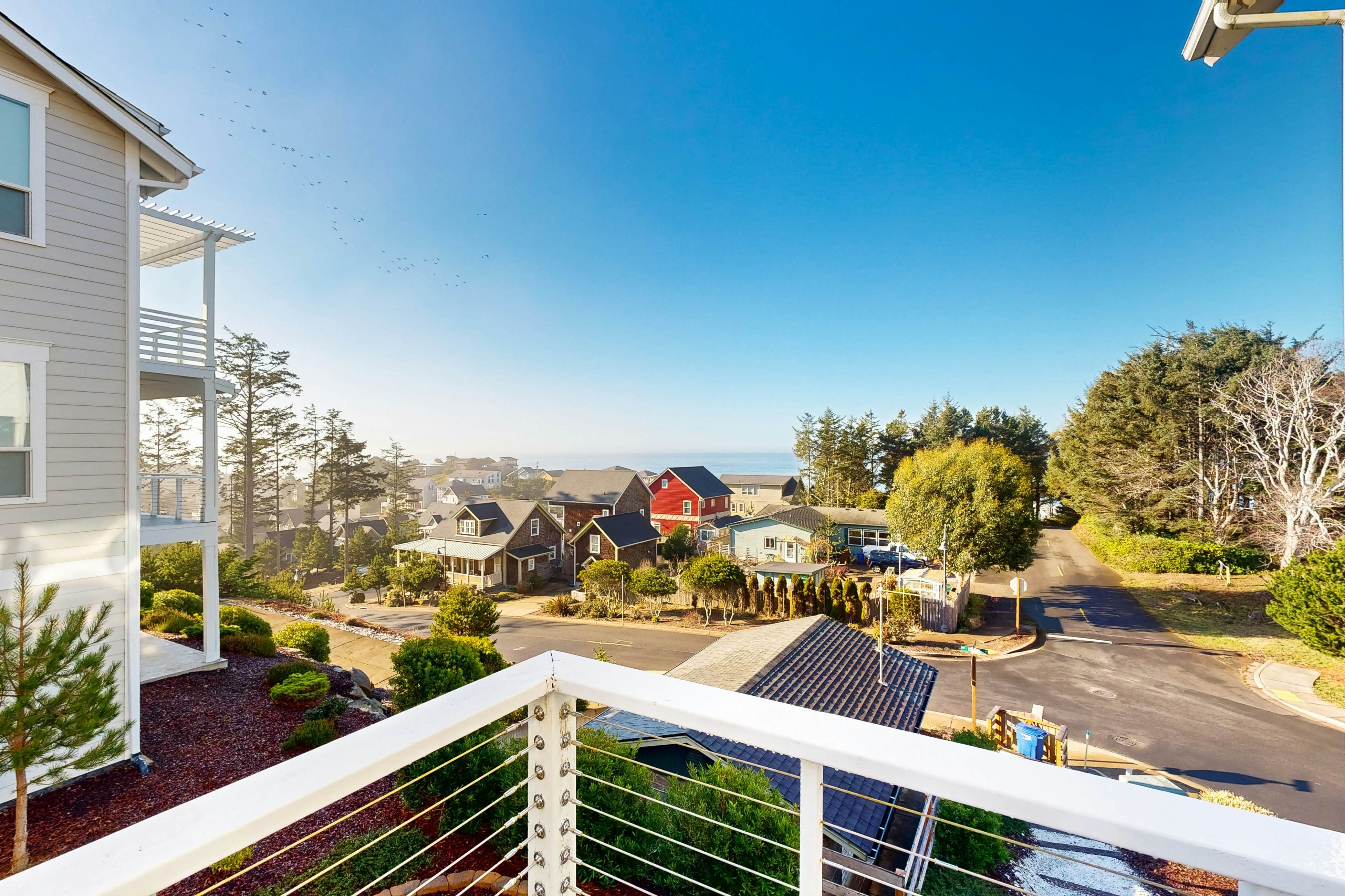 Beautiful family-friendly home with private hot tub, walk to beach, shared pool