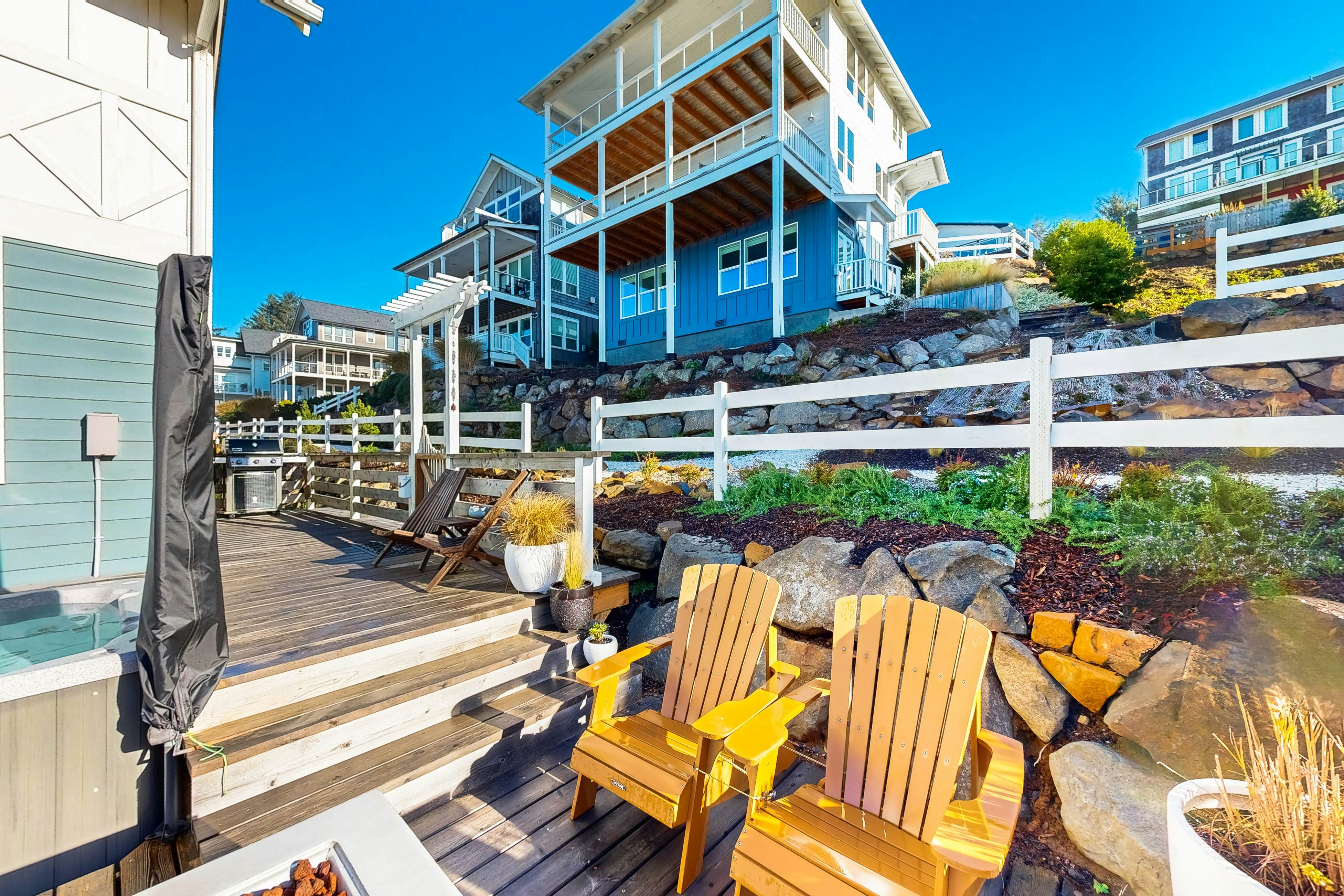 Beautiful family-friendly home with private hot tub, walk to beach, shared pool