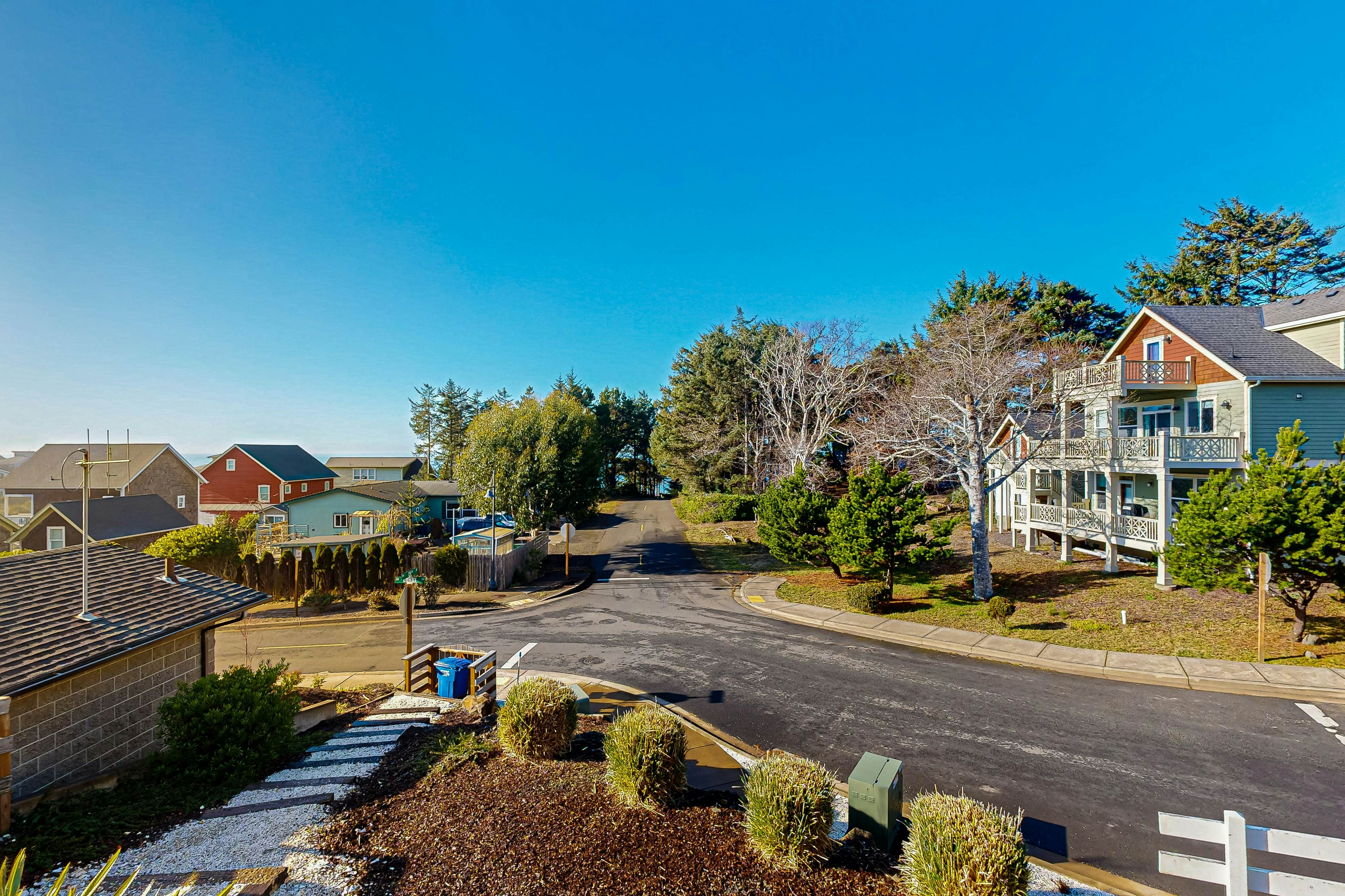 Beautiful family-friendly home with private hot tub, walk to beach, shared pool