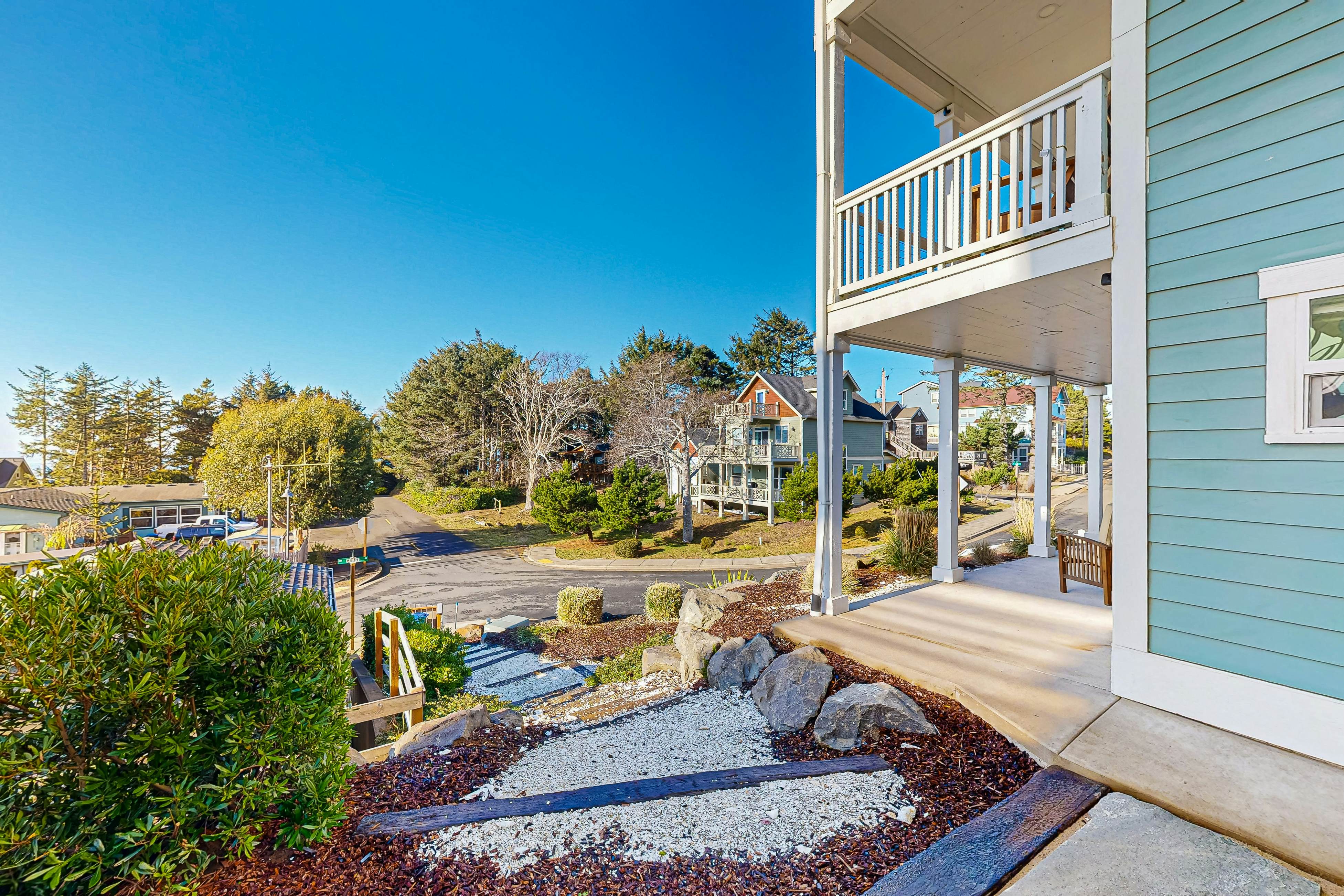 Beautiful family-friendly home with private hot tub, walk to beach, shared pool