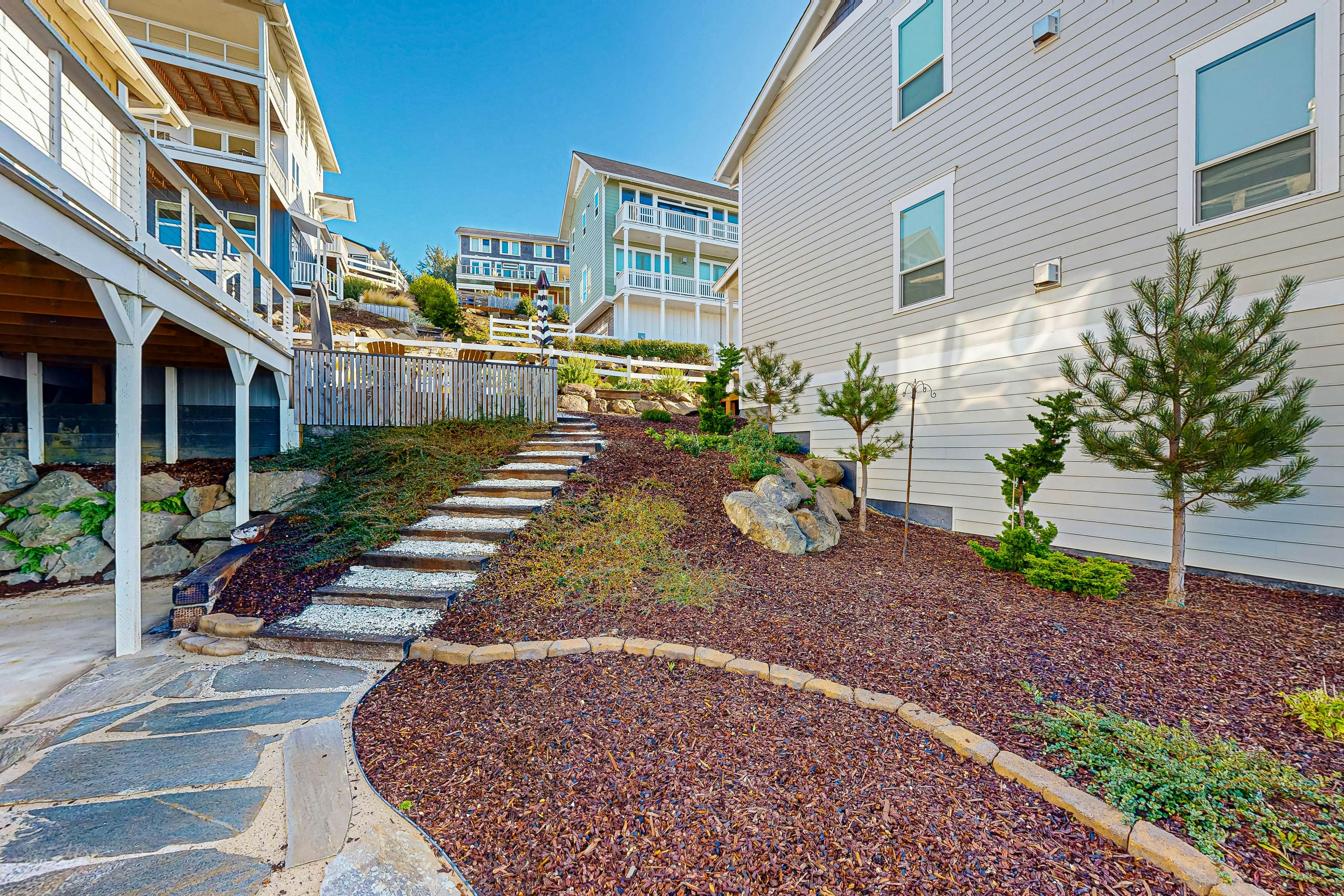 Beautiful family-friendly home with private hot tub, walk to beach, shared pool