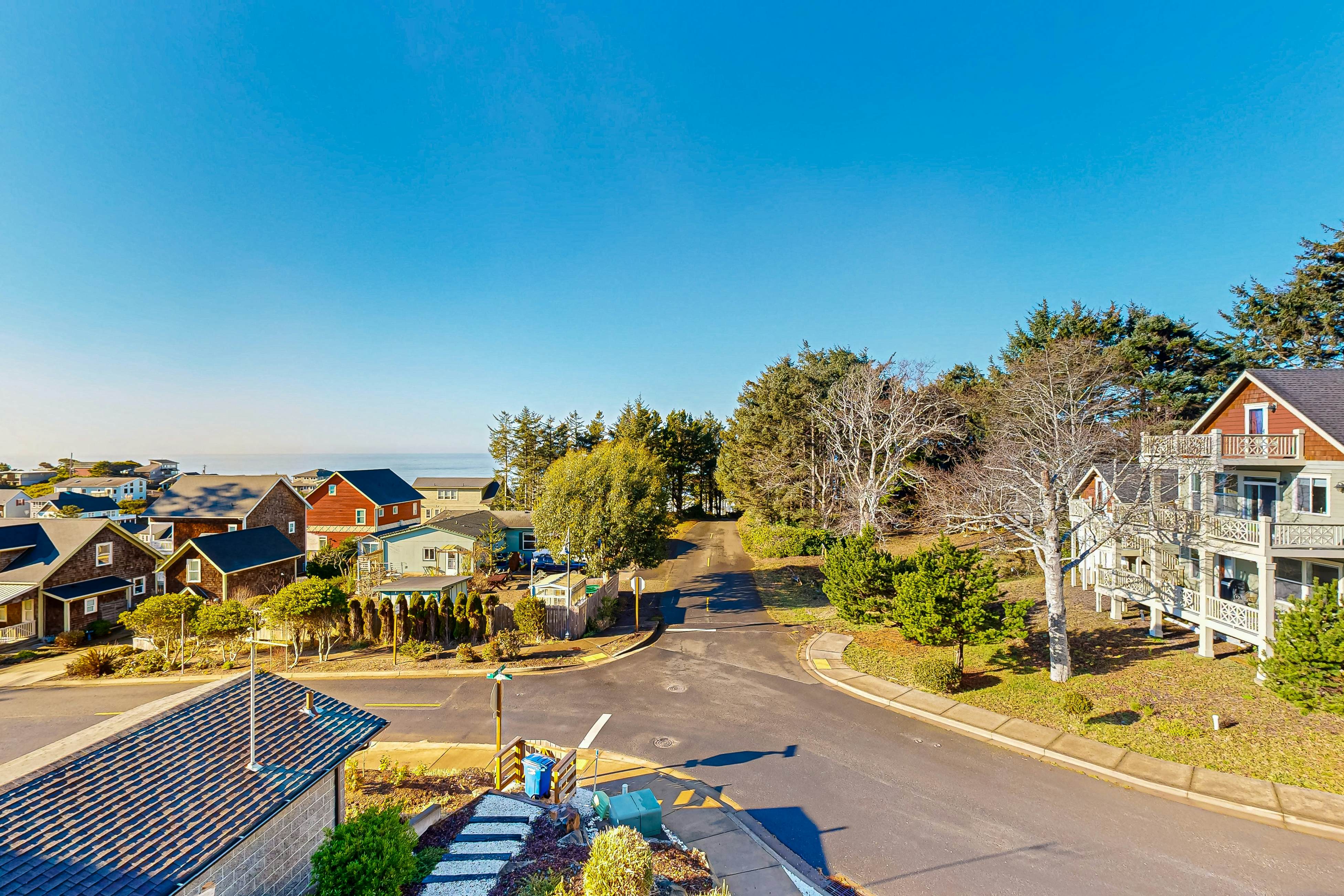 Beautiful family-friendly home with private hot tub, walk to beach, shared pool