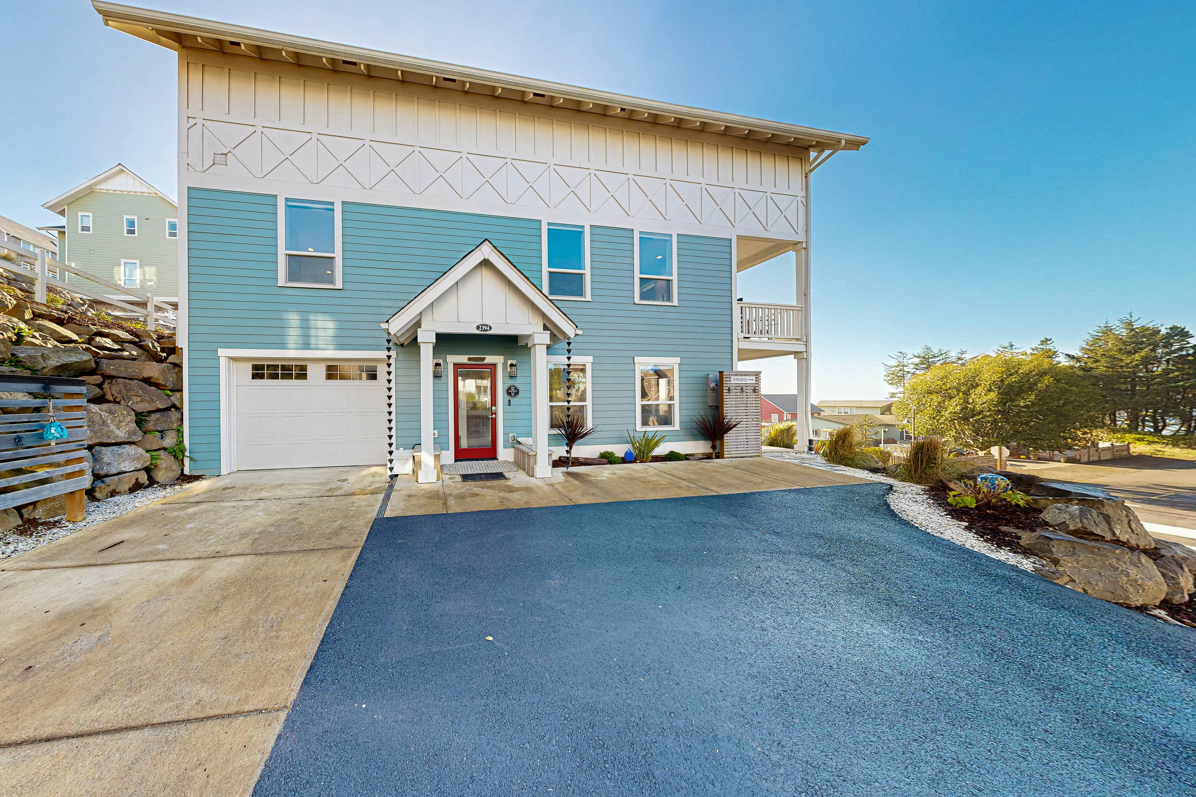 Beautiful family-friendly home with private hot tub, walk to beach, shared pool