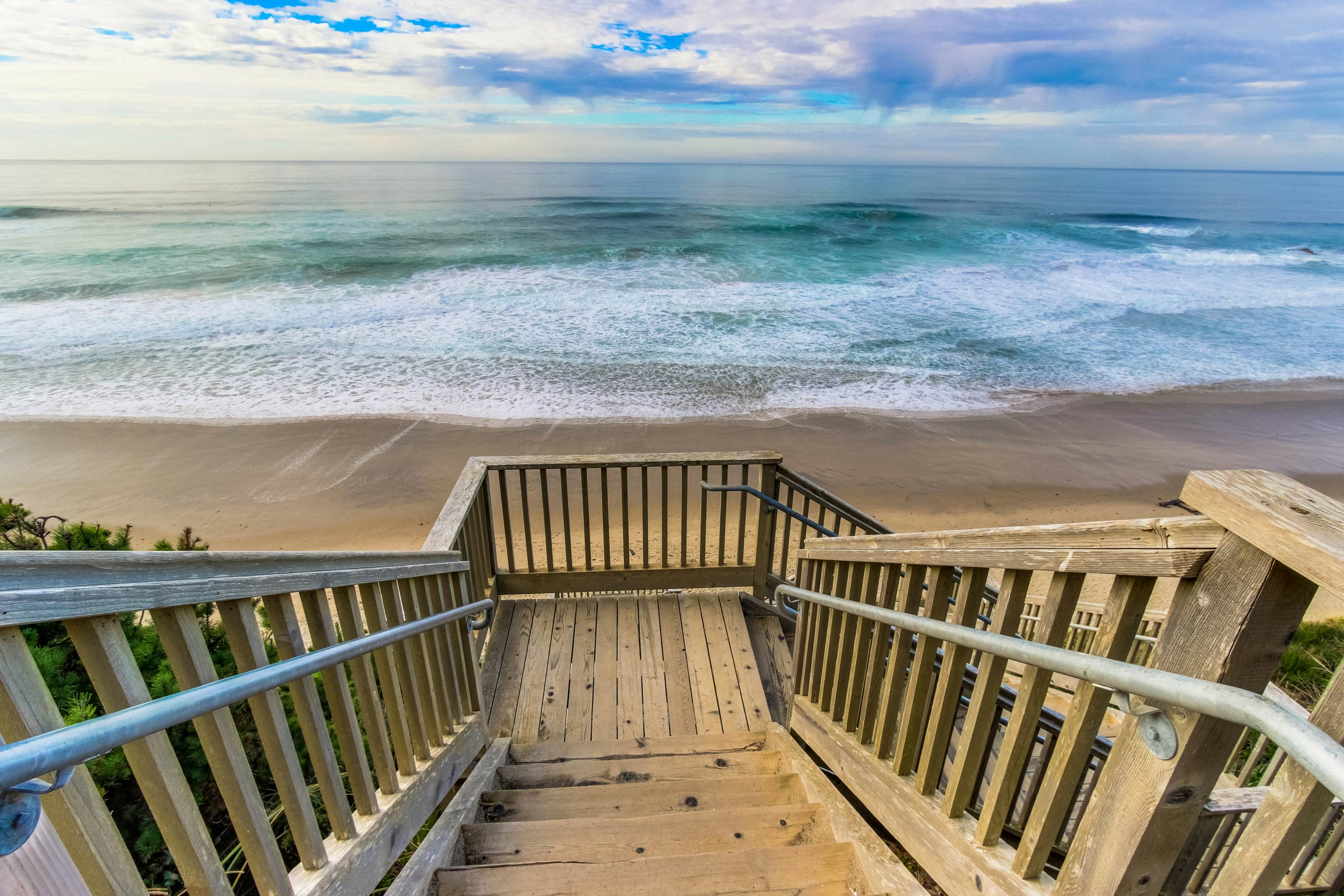 Beautiful family-friendly home with private hot tub, walk to beach, shared pool