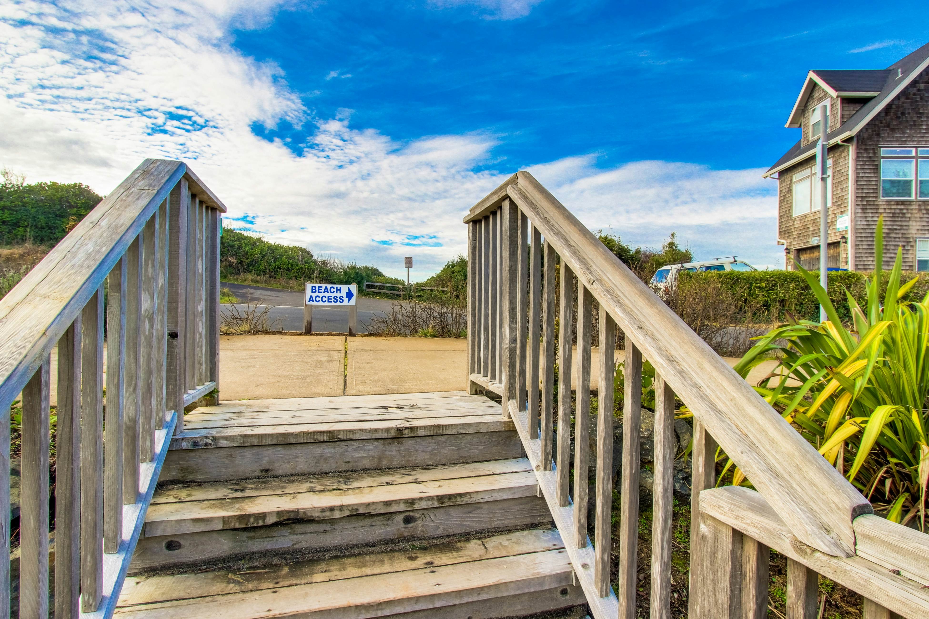 Beautiful family-friendly home with private hot tub, walk to beach, shared pool