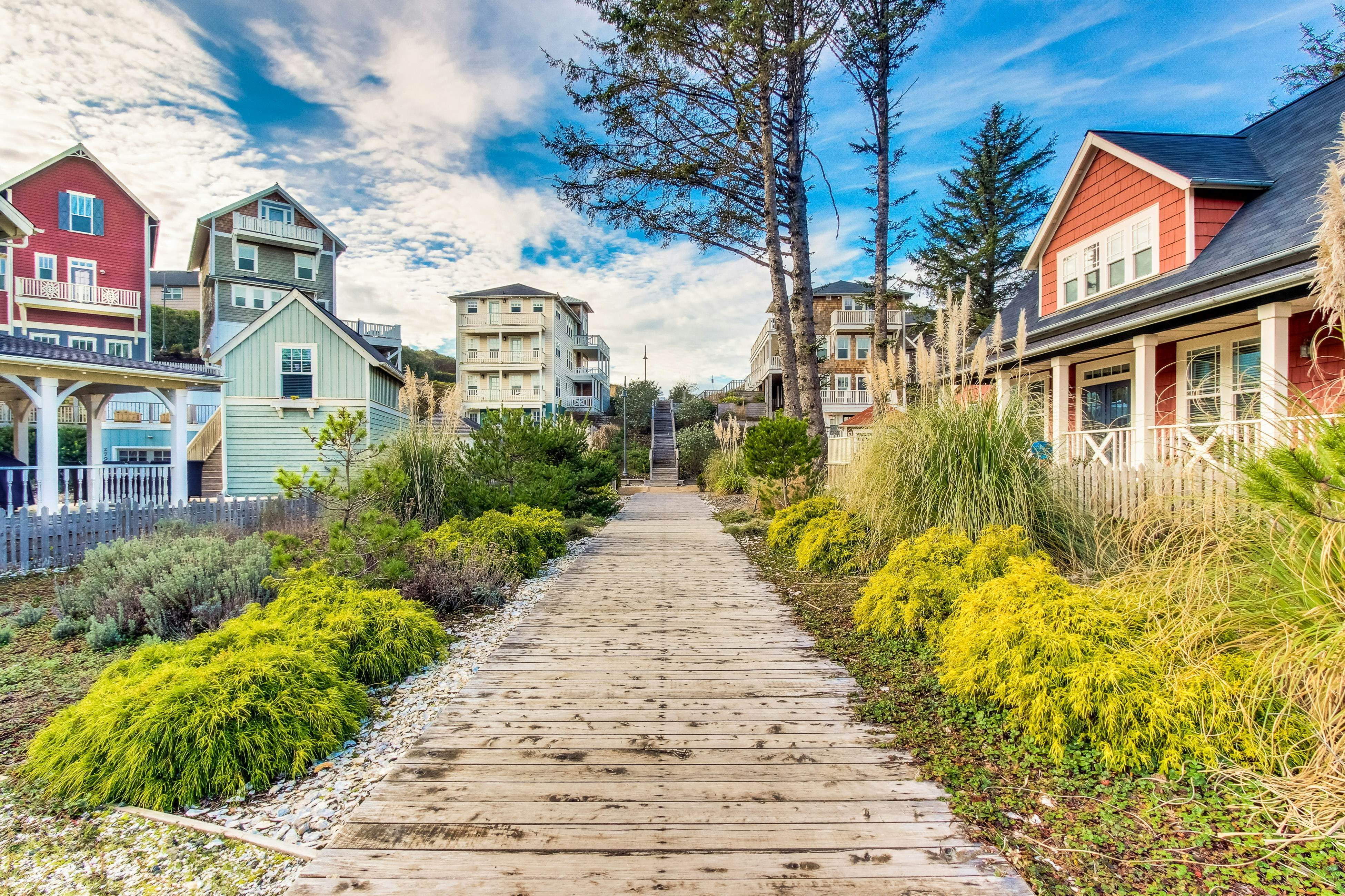 Beautiful family-friendly home with private hot tub, walk to beach, shared pool