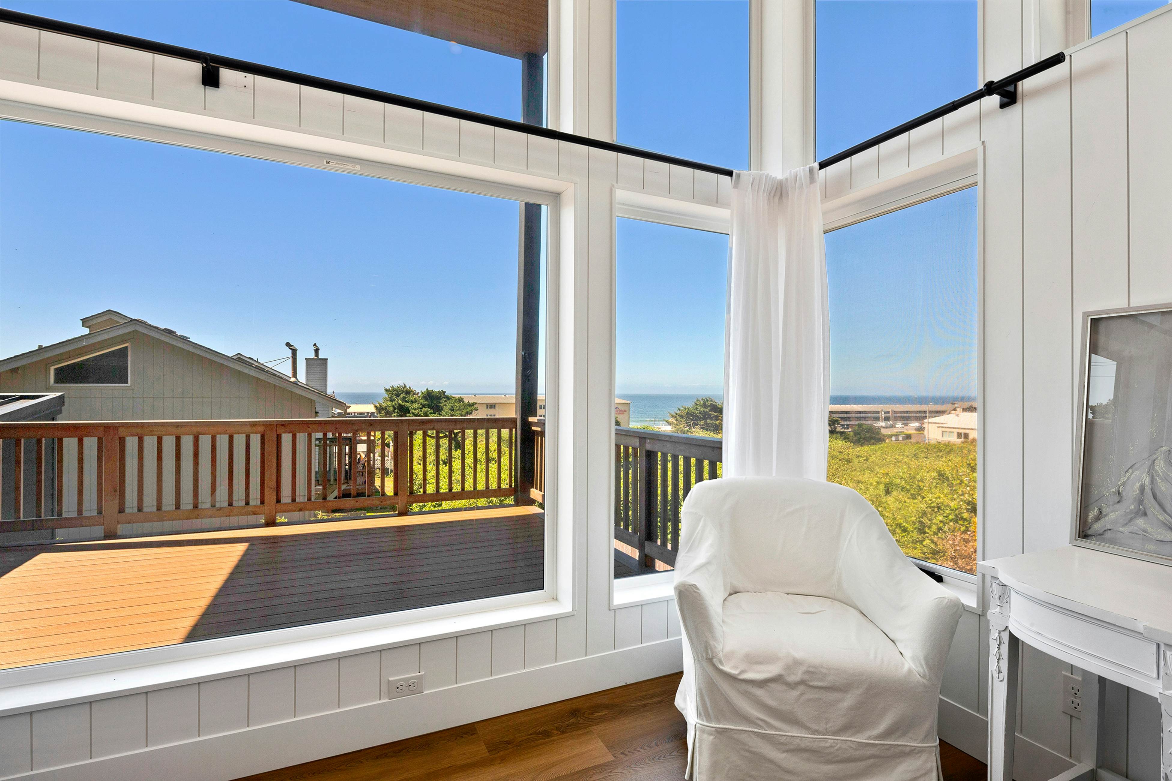 Spacious home with ocean view, enclosed yard, fireplace, hut tub, washer & dryer