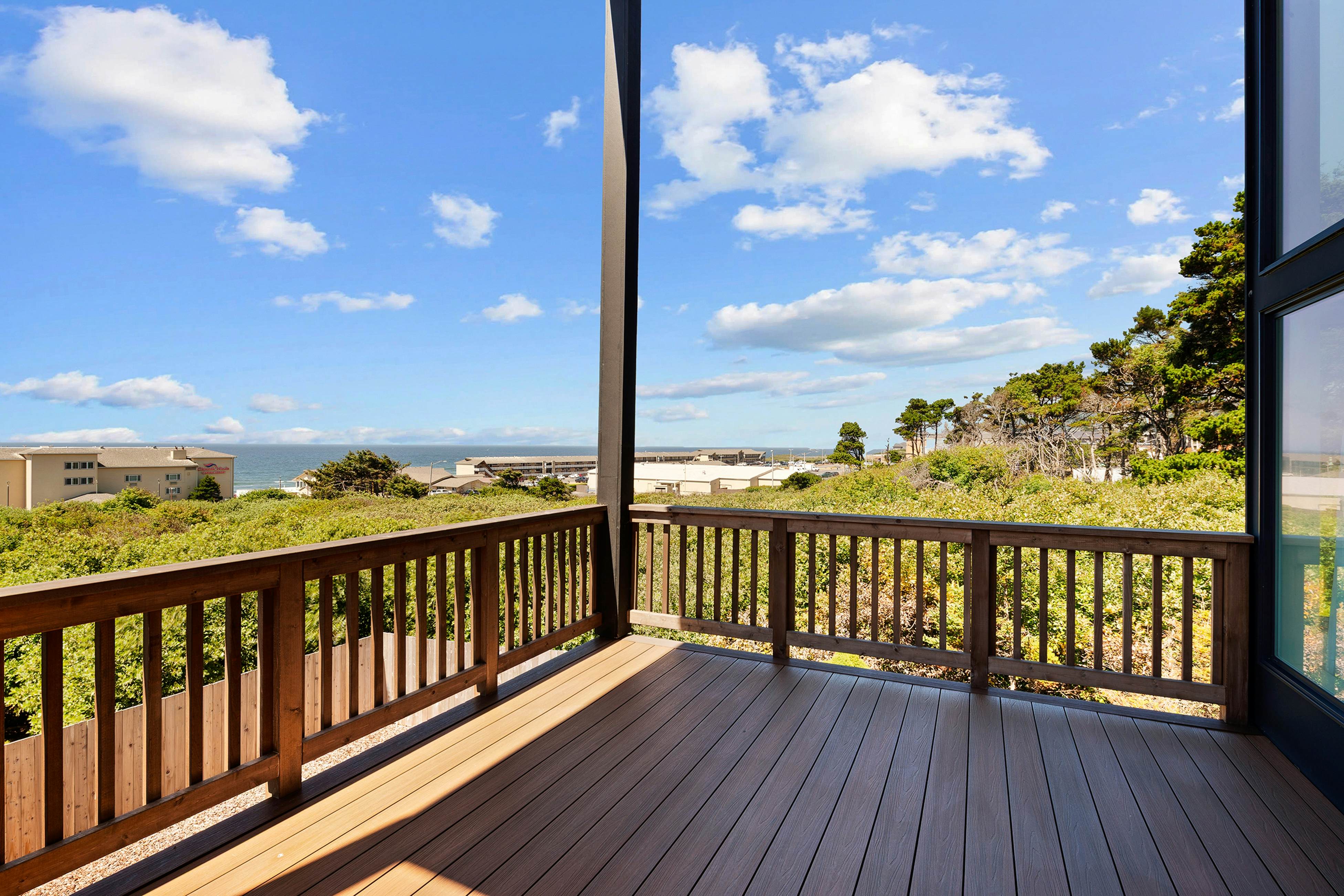 Spacious home with ocean view, enclosed yard, fireplace, hut tub, washer & dryer