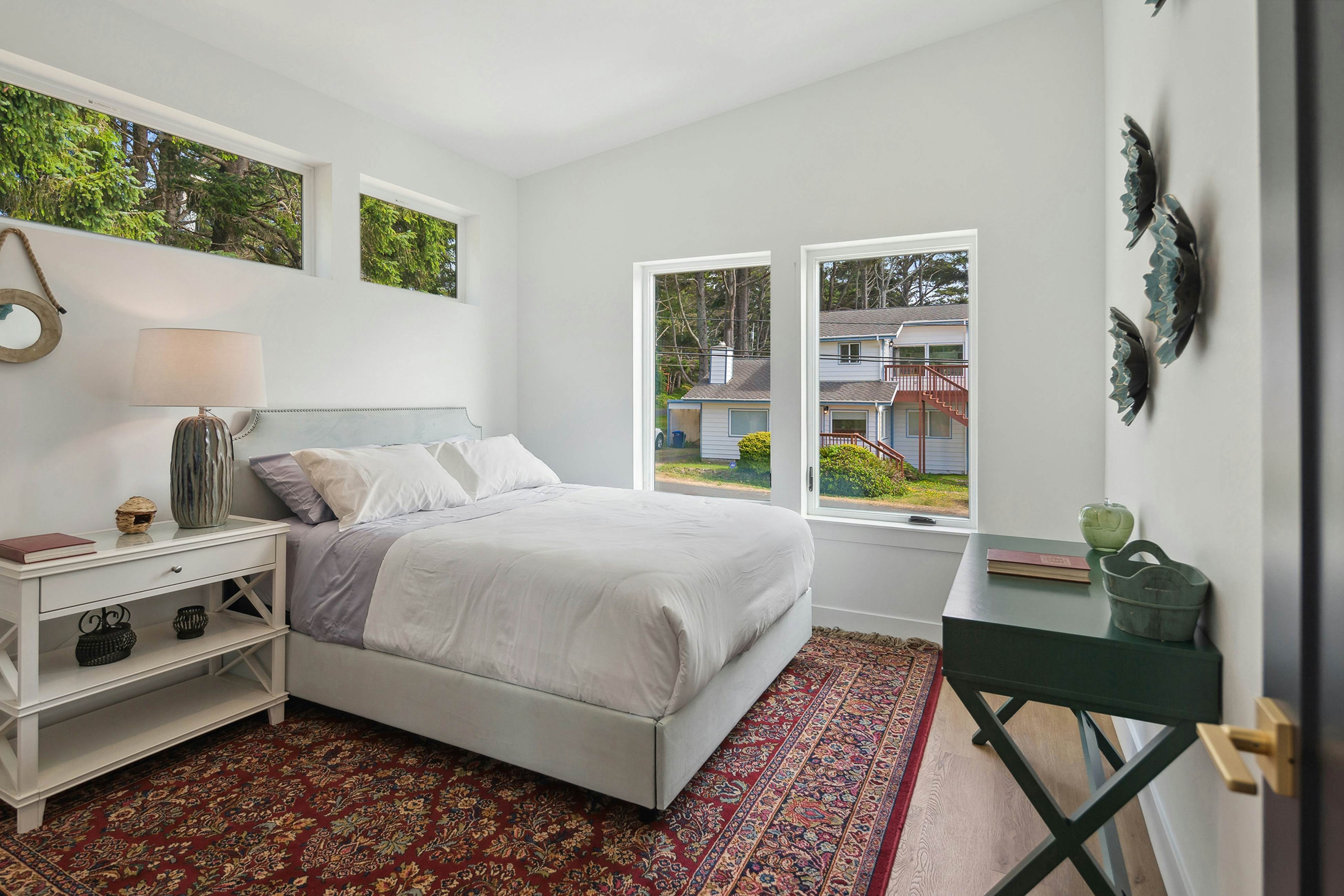 Spacious home with ocean view, enclosed yard, fireplace, hut tub, washer & dryer