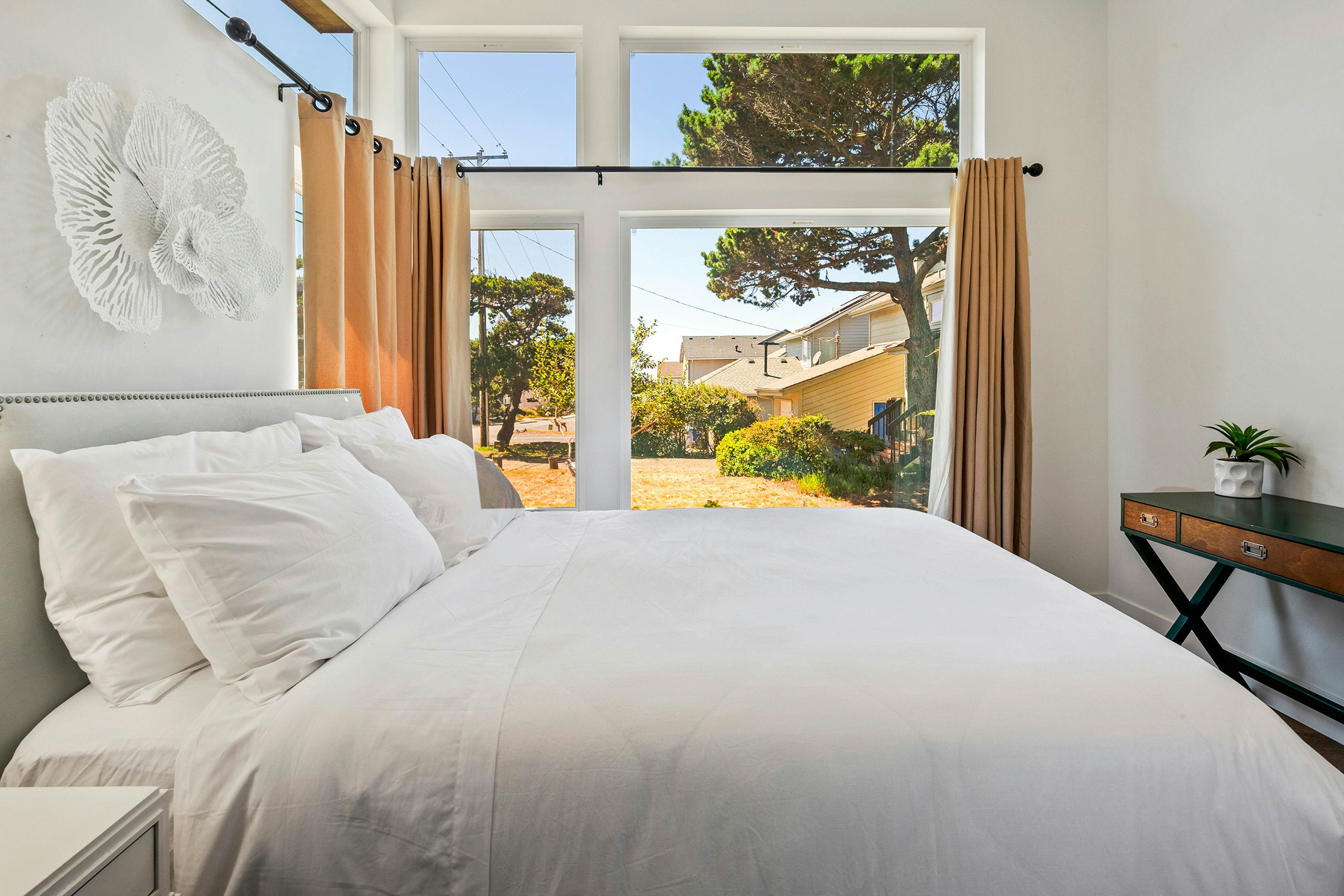 Spacious home with ocean view, enclosed yard, fireplace, hut tub, washer & dryer