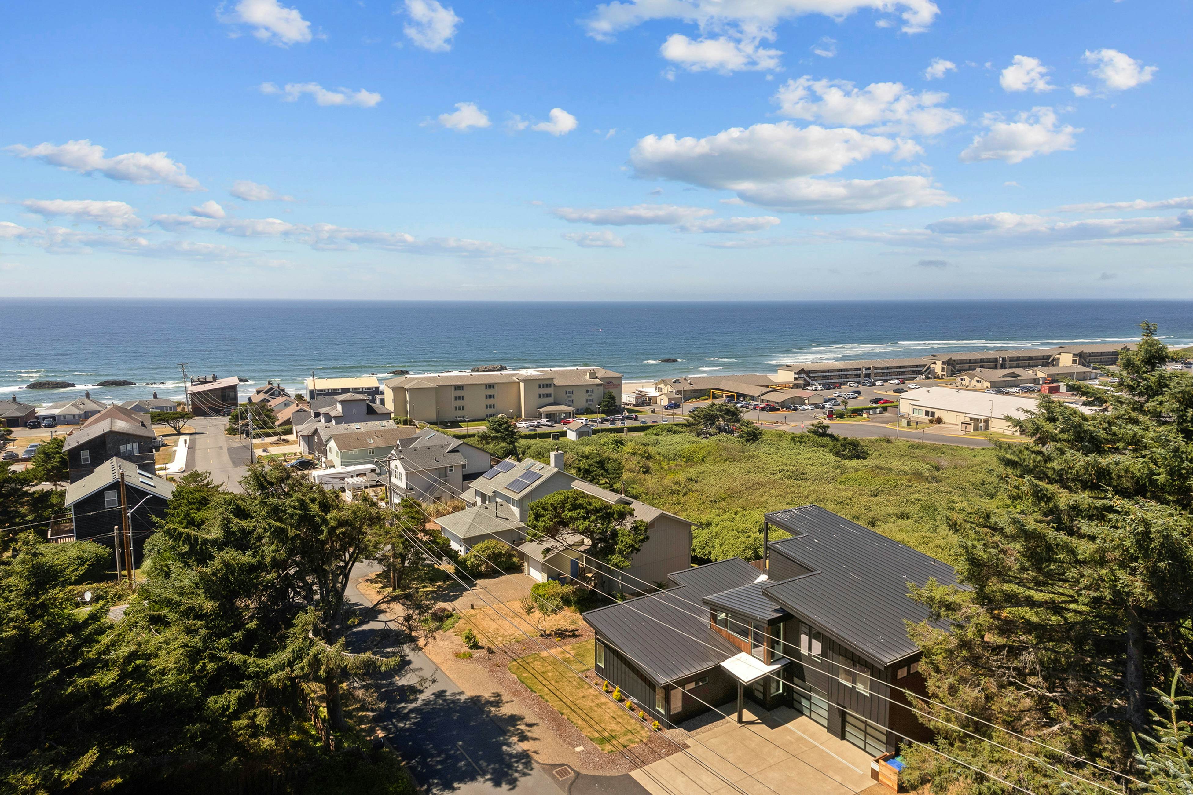Spacious home with ocean view, enclosed yard, fireplace, hut tub, washer & dryer