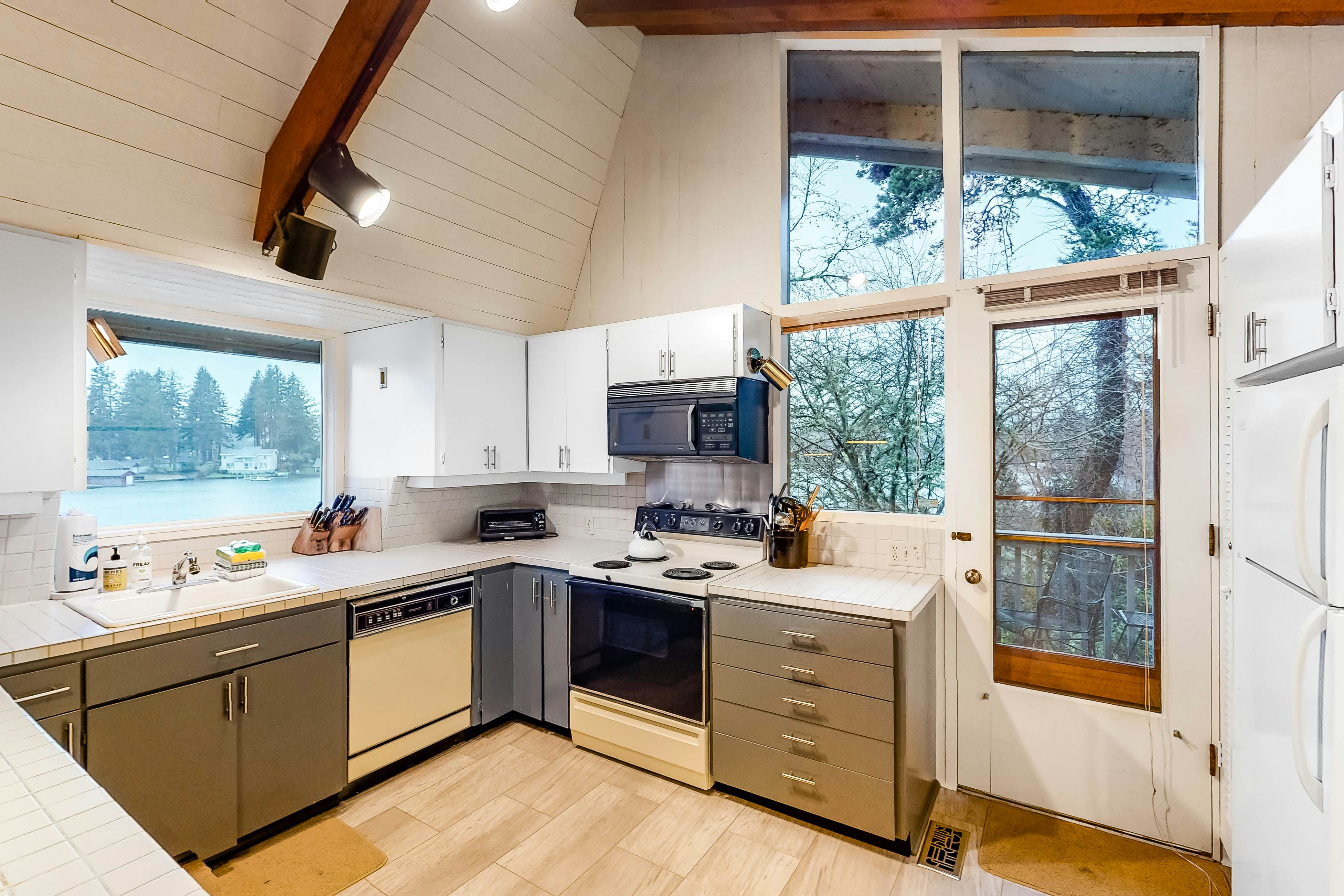 Lakefront house w/ private dock, firepit, and sunset views