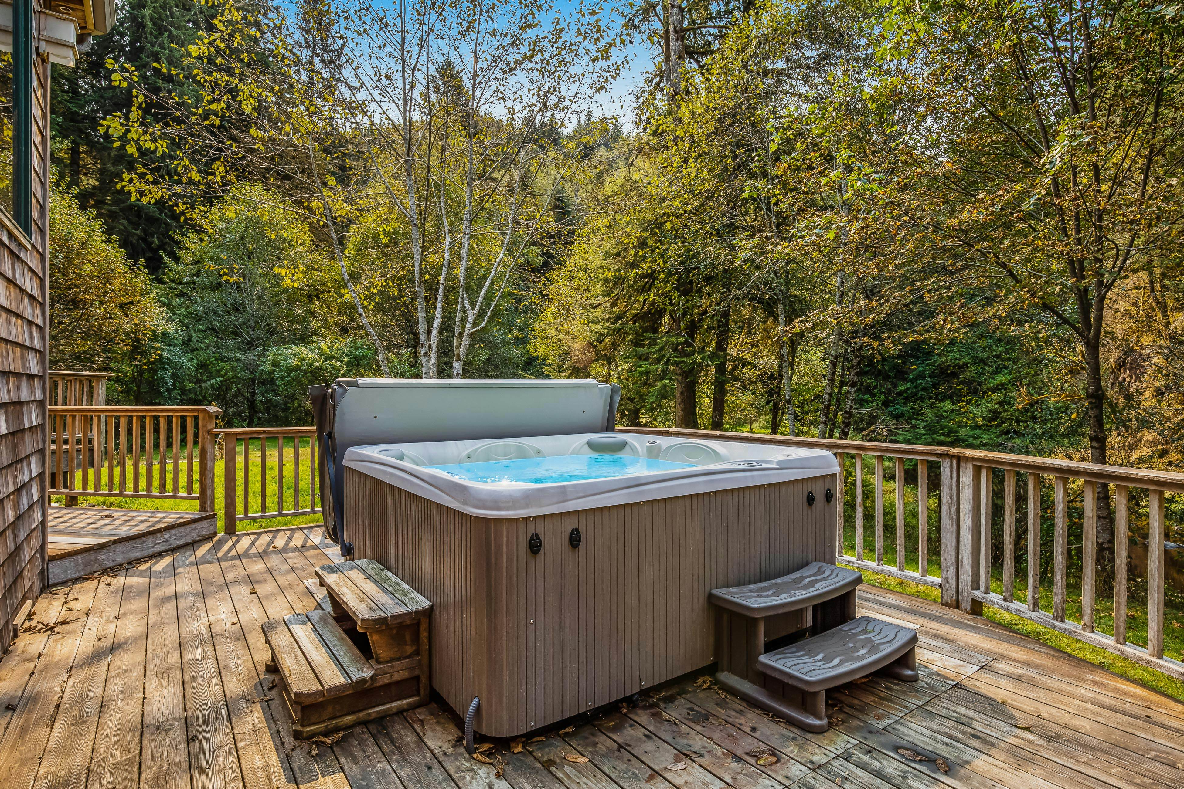 Luxury Riverfront Home with Several Acres Hot Tub and Swimming Holes Dogs OK