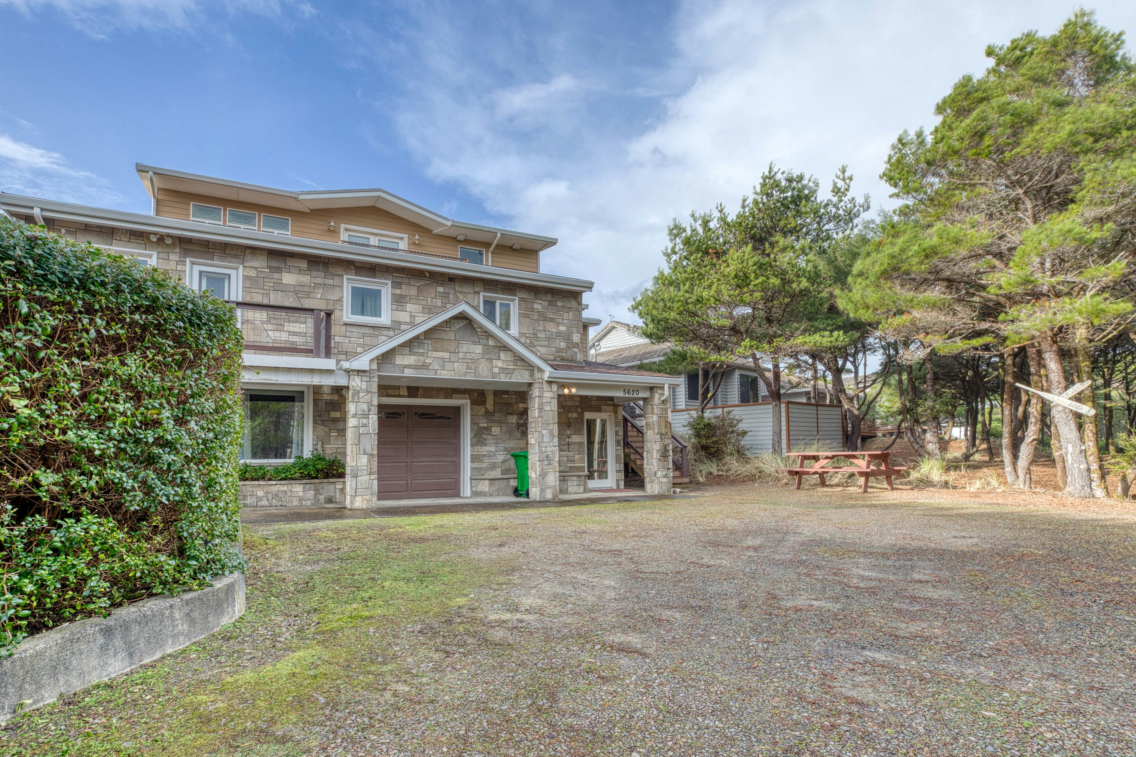 Beachfront home with amazing ocean views, entertainment space, & balcony