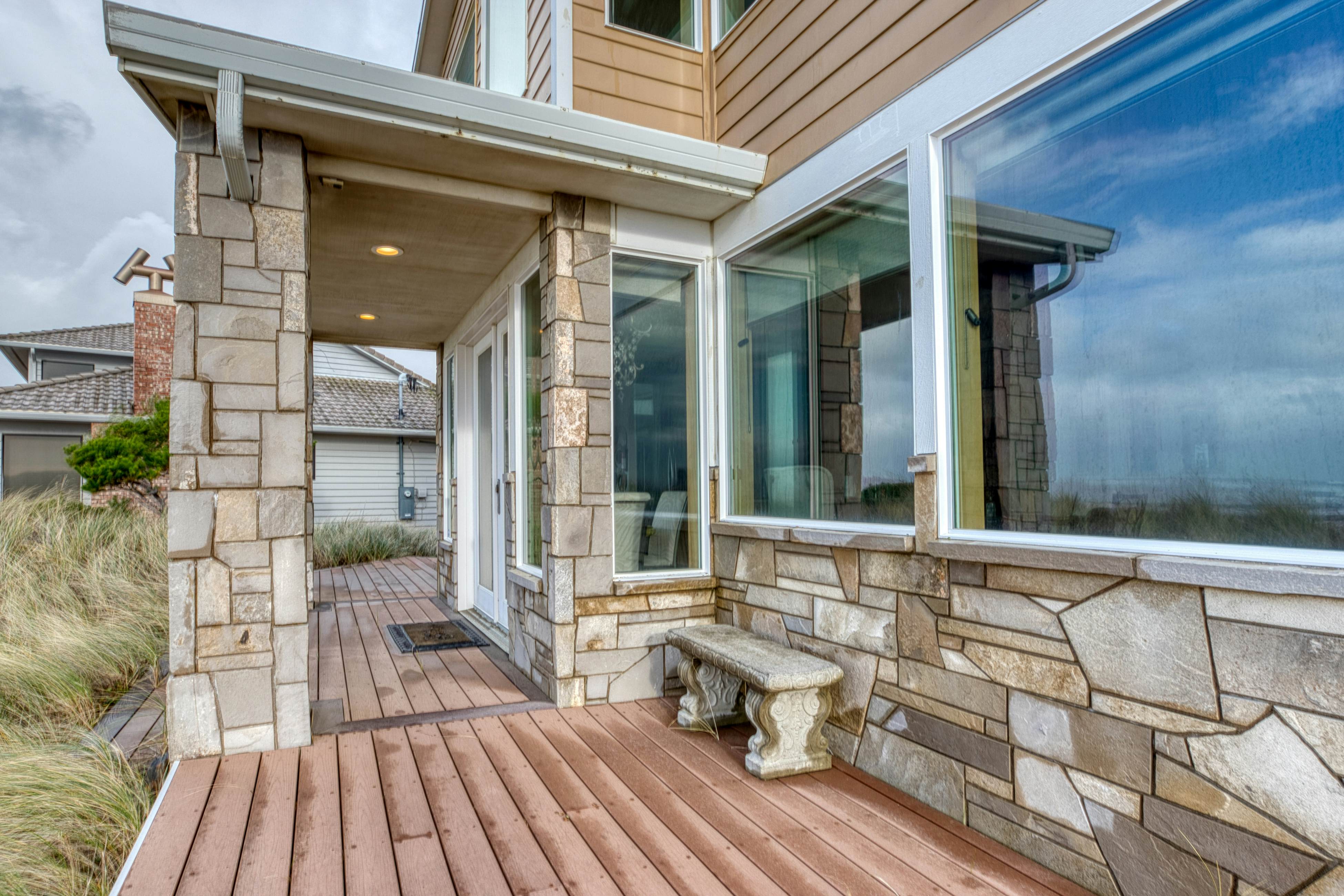 Beachfront home with amazing ocean views entertainment space and balcony