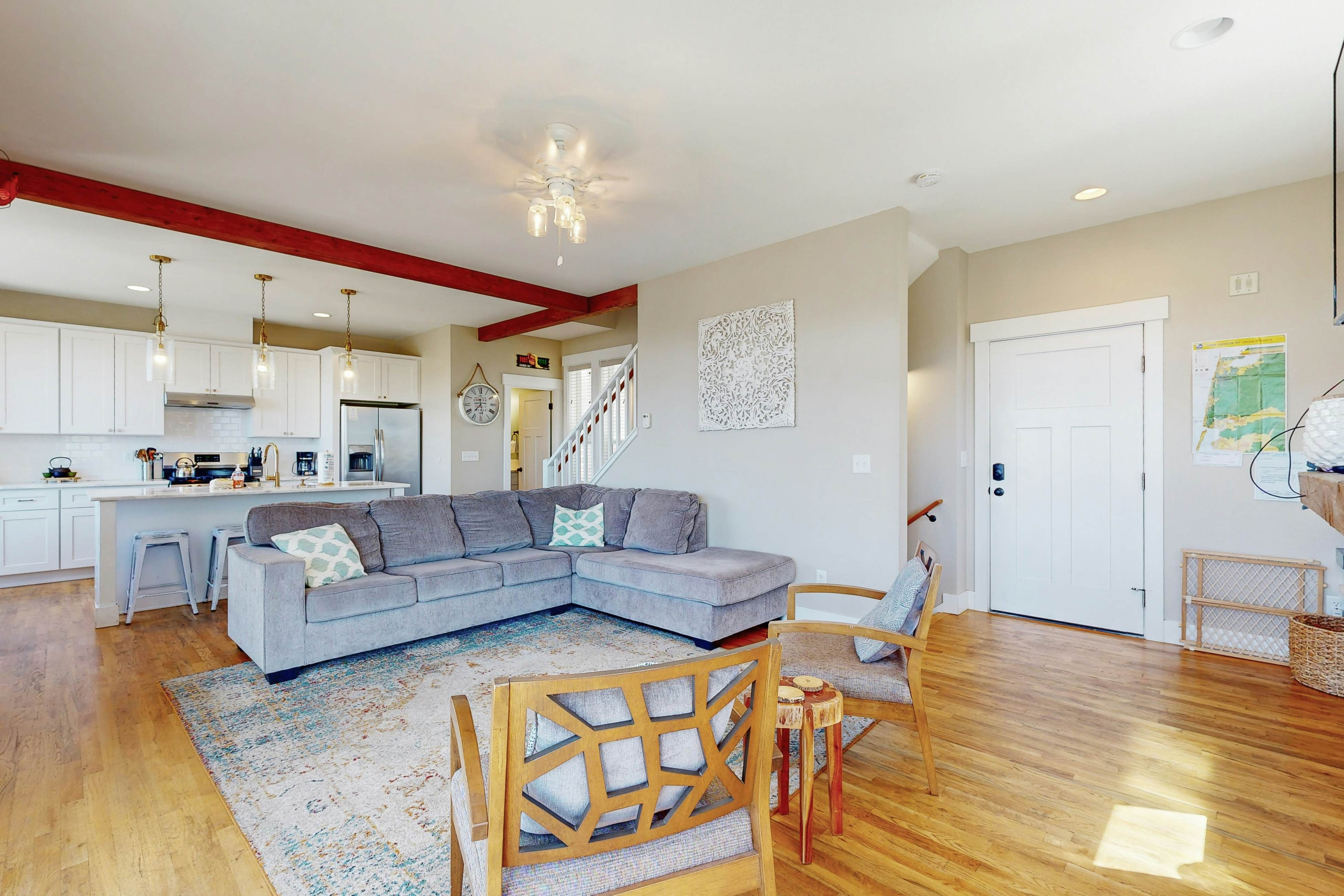 Ocean-view home in Olivia Beach with decks, fireplaces & pool access - dogs ok