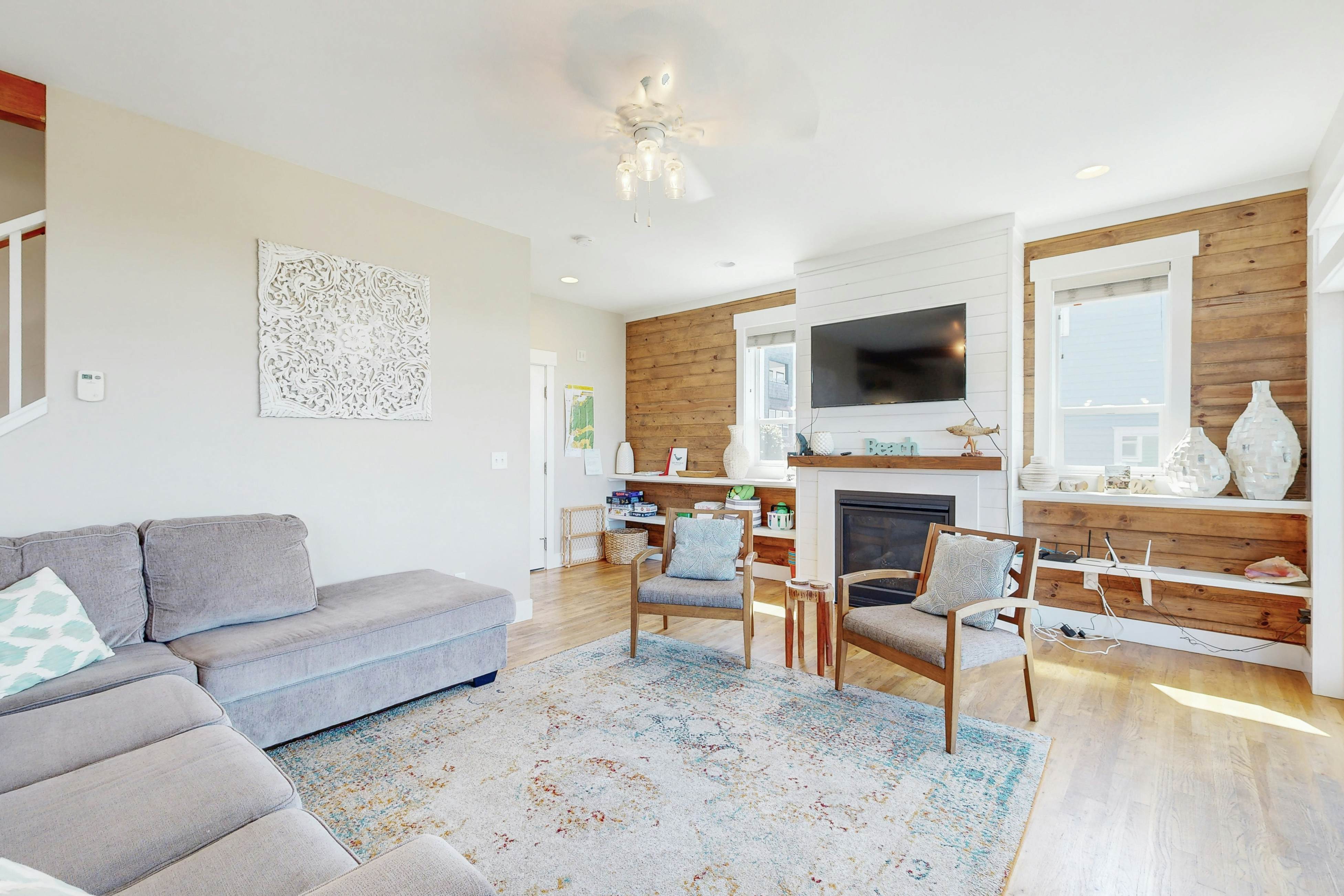 Ocean-view home in Olivia Beach with decks, fireplaces & pool access - dogs ok