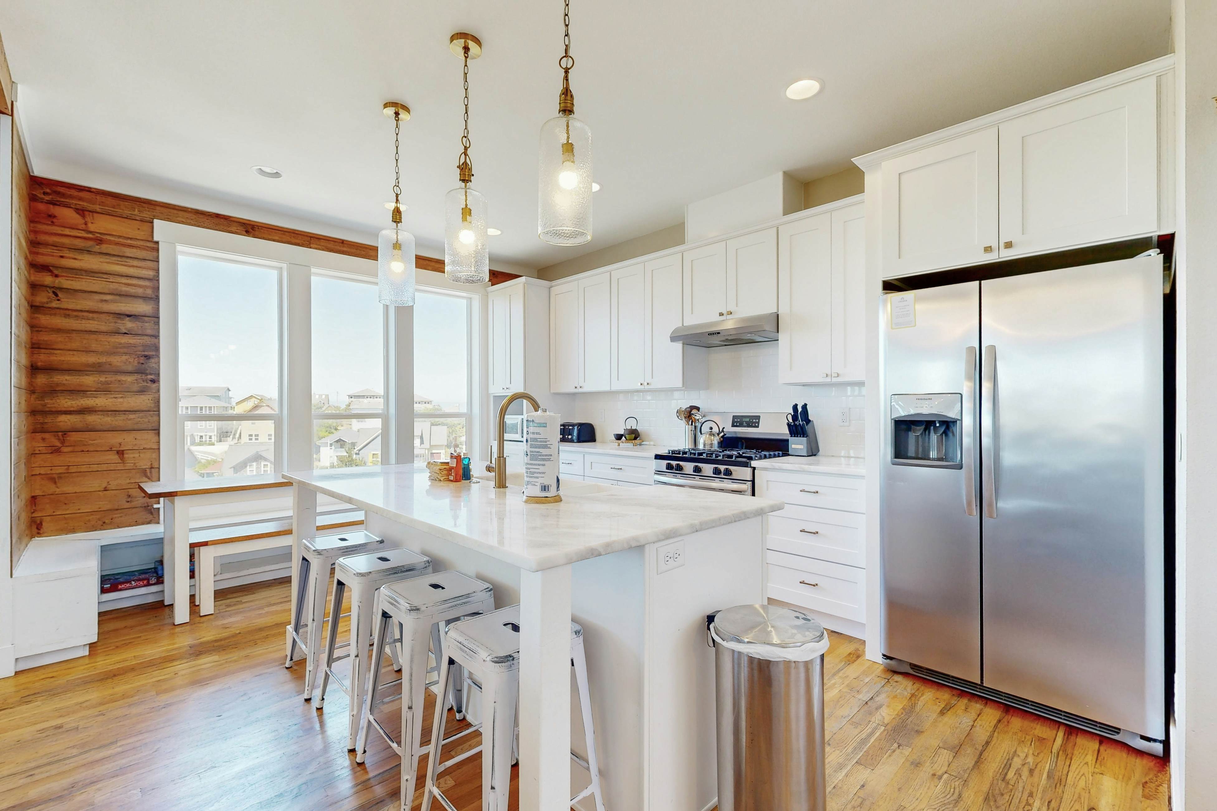 Ocean-view home in Olivia Beach with decks, fireplaces & pool access - dogs ok