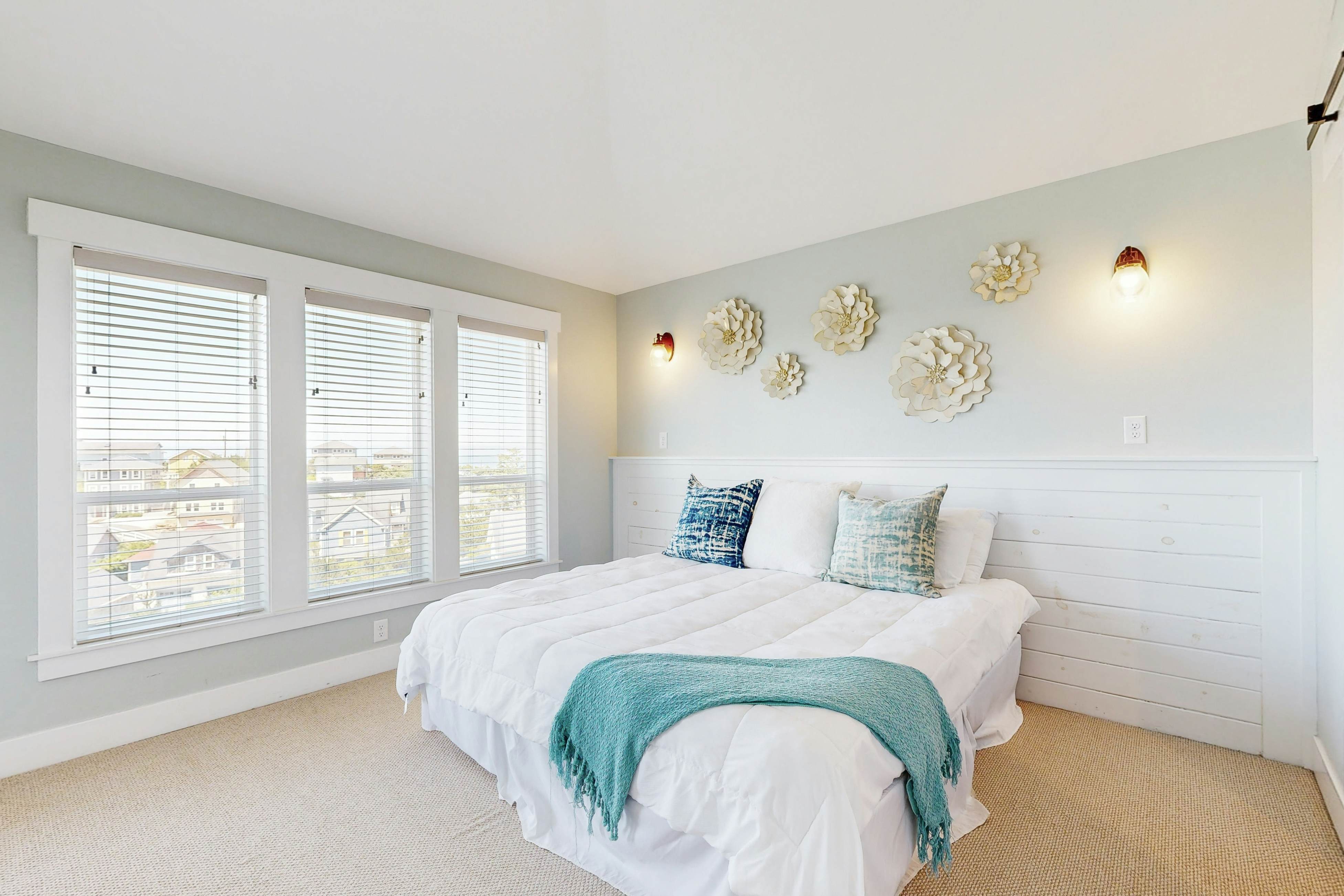 Ocean-view home in Olivia Beach with decks, fireplaces & pool access - dogs ok