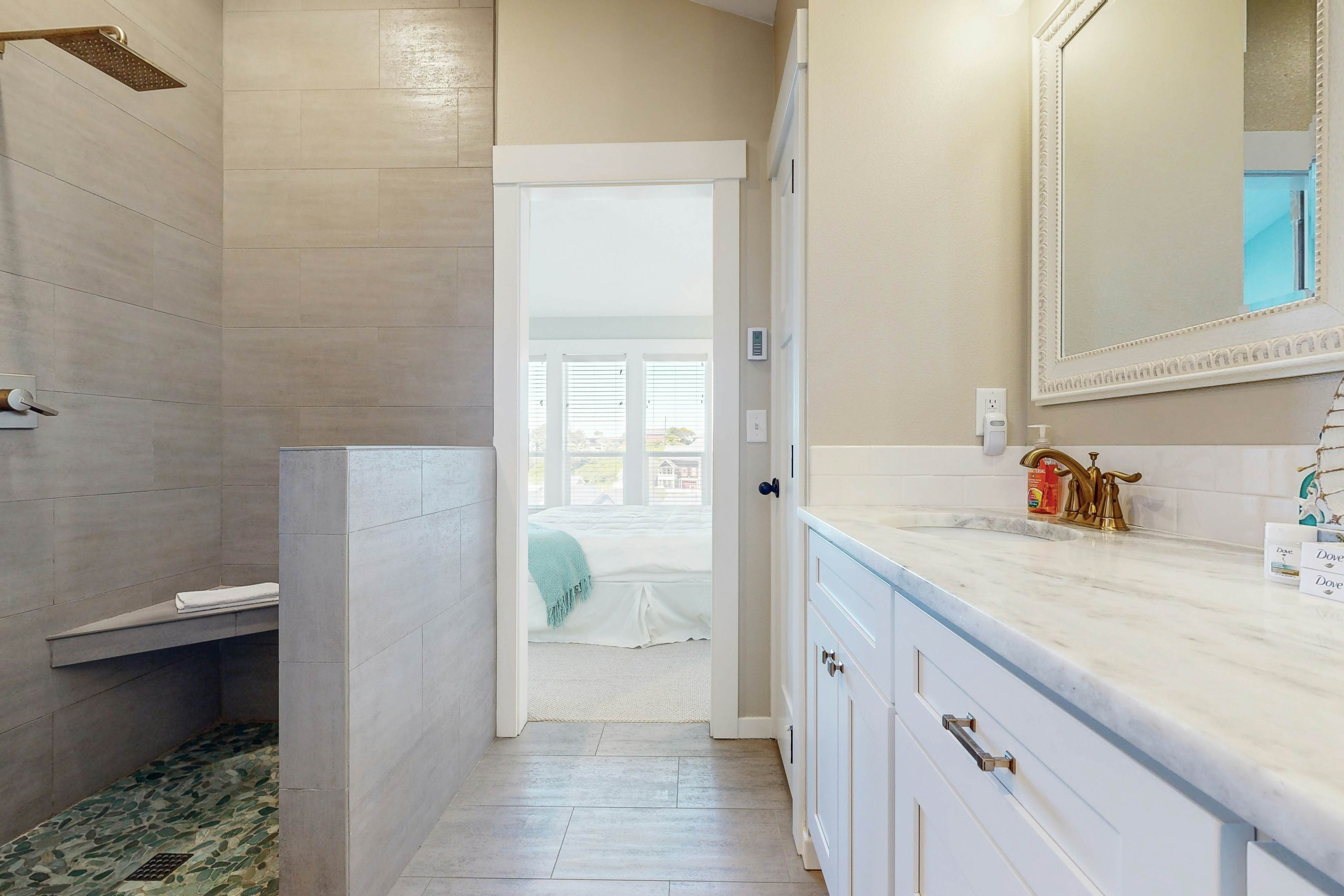 Ocean-view home in Olivia Beach with decks, fireplaces & pool access - dogs ok